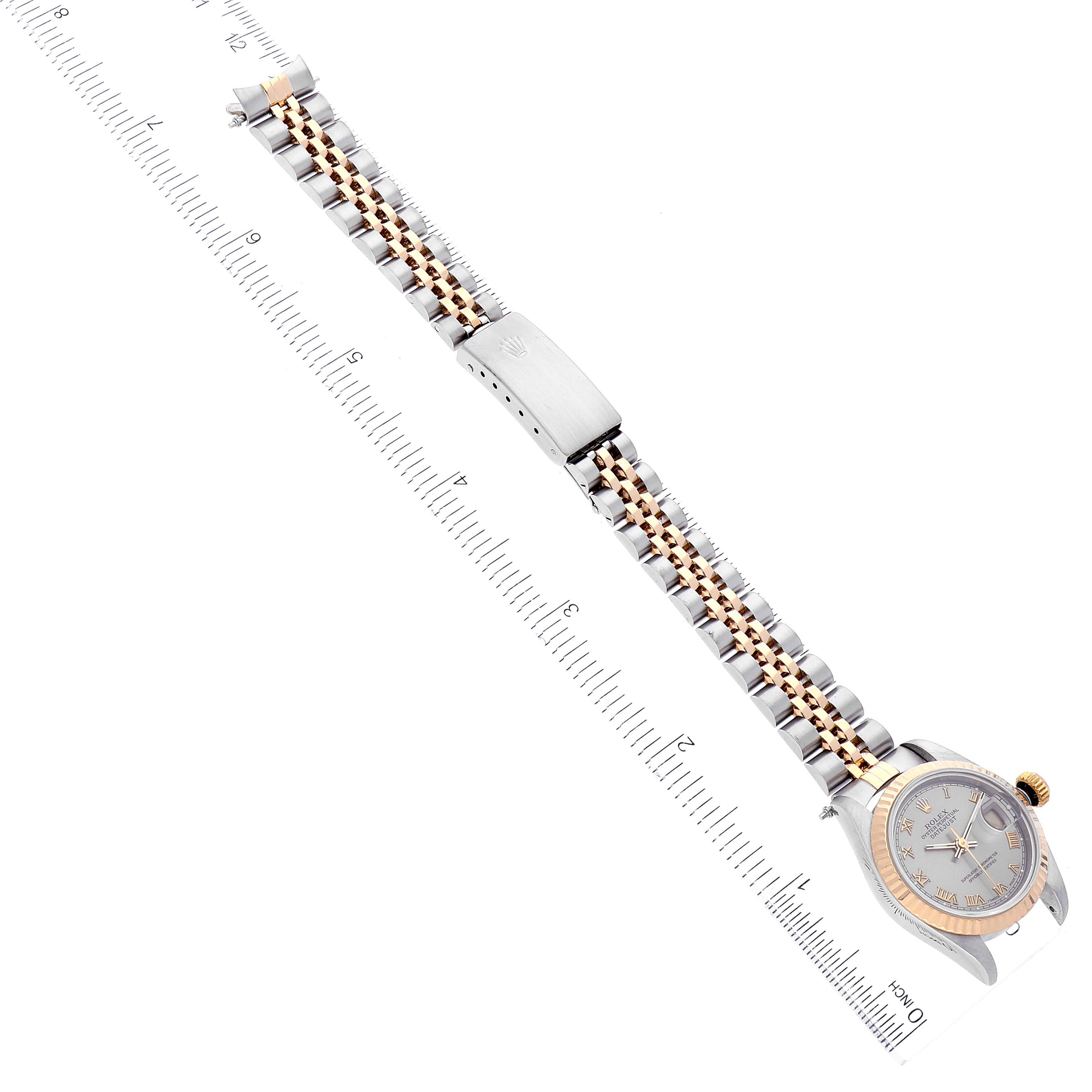 The image shows a Rolex Datejust 69173 Women's Steel and Gold (two tone) Grey Dial 69173 Women's Steel and Gold (two tone) Grey Dial watch laid flat alongside a measuring ruler, displaying its bracelet, clasp, and watch face.