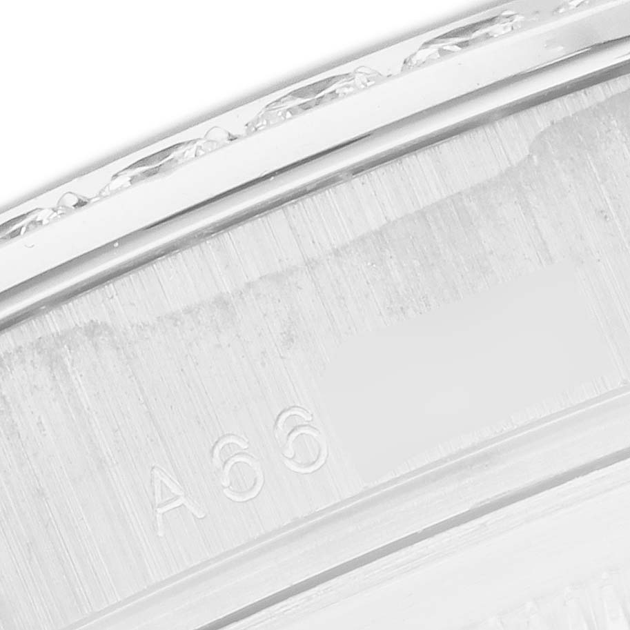 This image shows a detailed close-up of the side of a Rolex Pearlmaster 18946 Men
s Platinum Mother of Pearl Dial watch, focusing on the engraved markings.