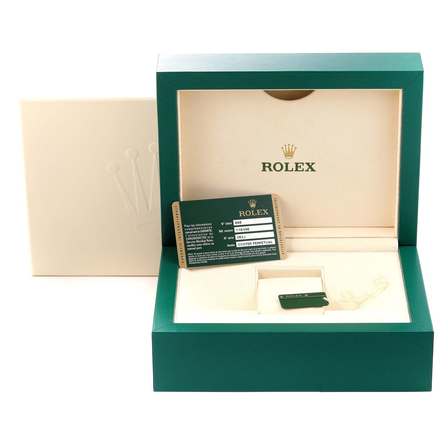 The image shows the packaging and accessories for a Rolex President 118348 Men
s Yellow Gold Champagne Dial 118348 Men
s Yellow Gold Champagne Dial model, including the box, warranty card, and Rolex tag.
