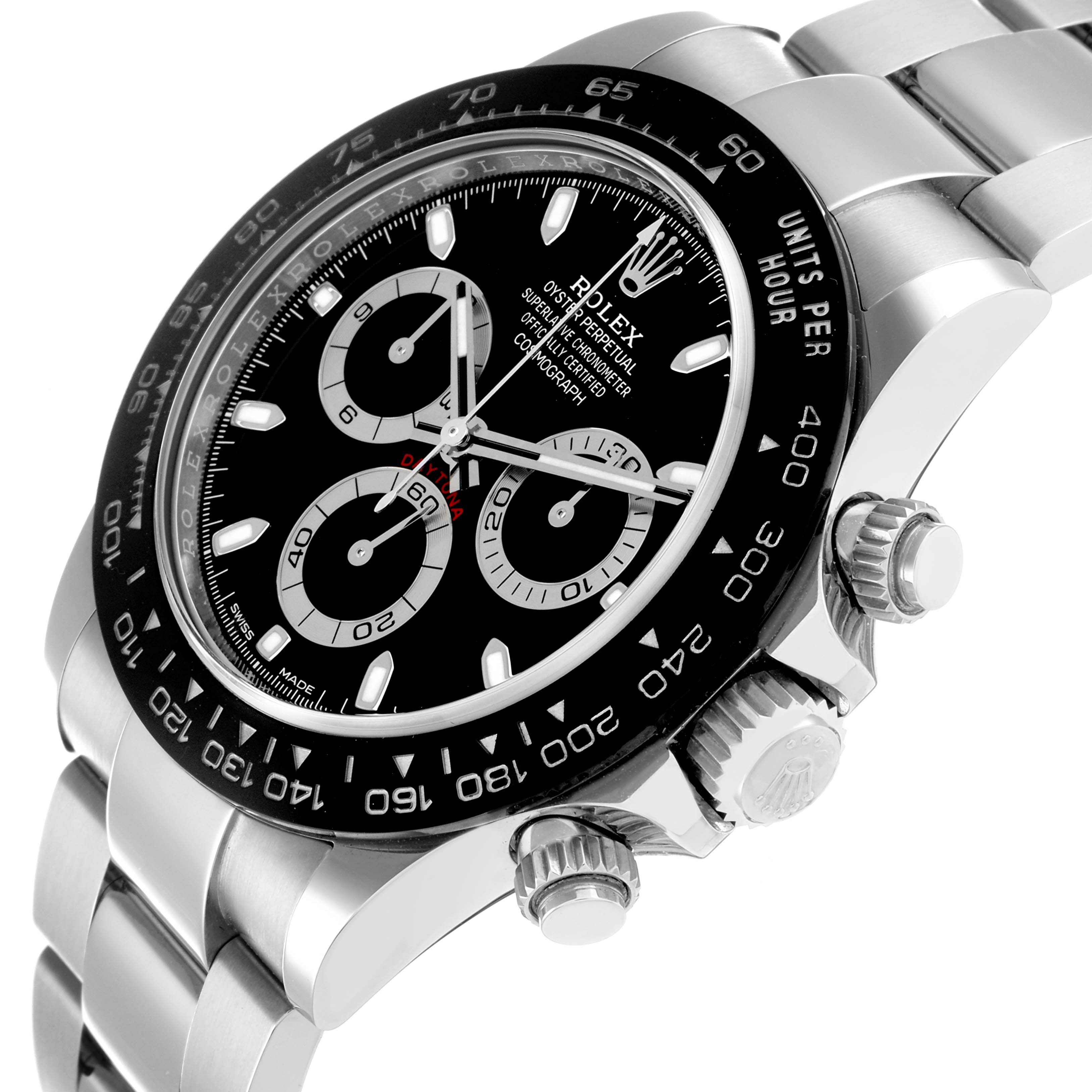 The Rolex Daytona 116500 Men
s Stainless Steel Black Dial watch is shown at a three-quarter angle, highlighting its dial, bezel, crown, and part of the bracelet.