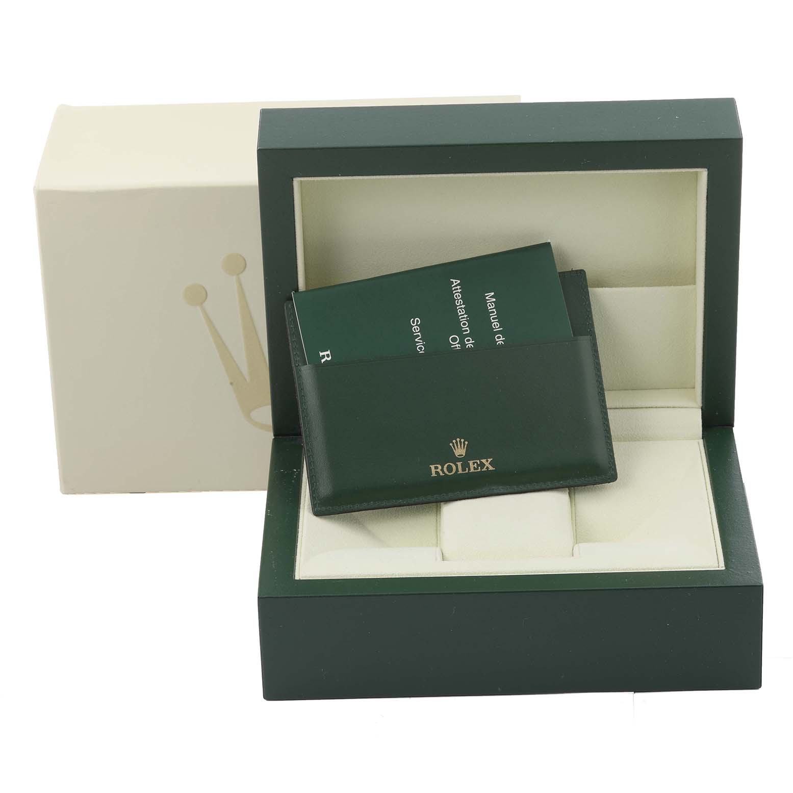 This image shows the packaging of a Rolex Daytona 116520 Men's Stainless Steel Black Dial 116520 Men's Stainless Steel Black Dial watch, including the watch box and documentation folder.