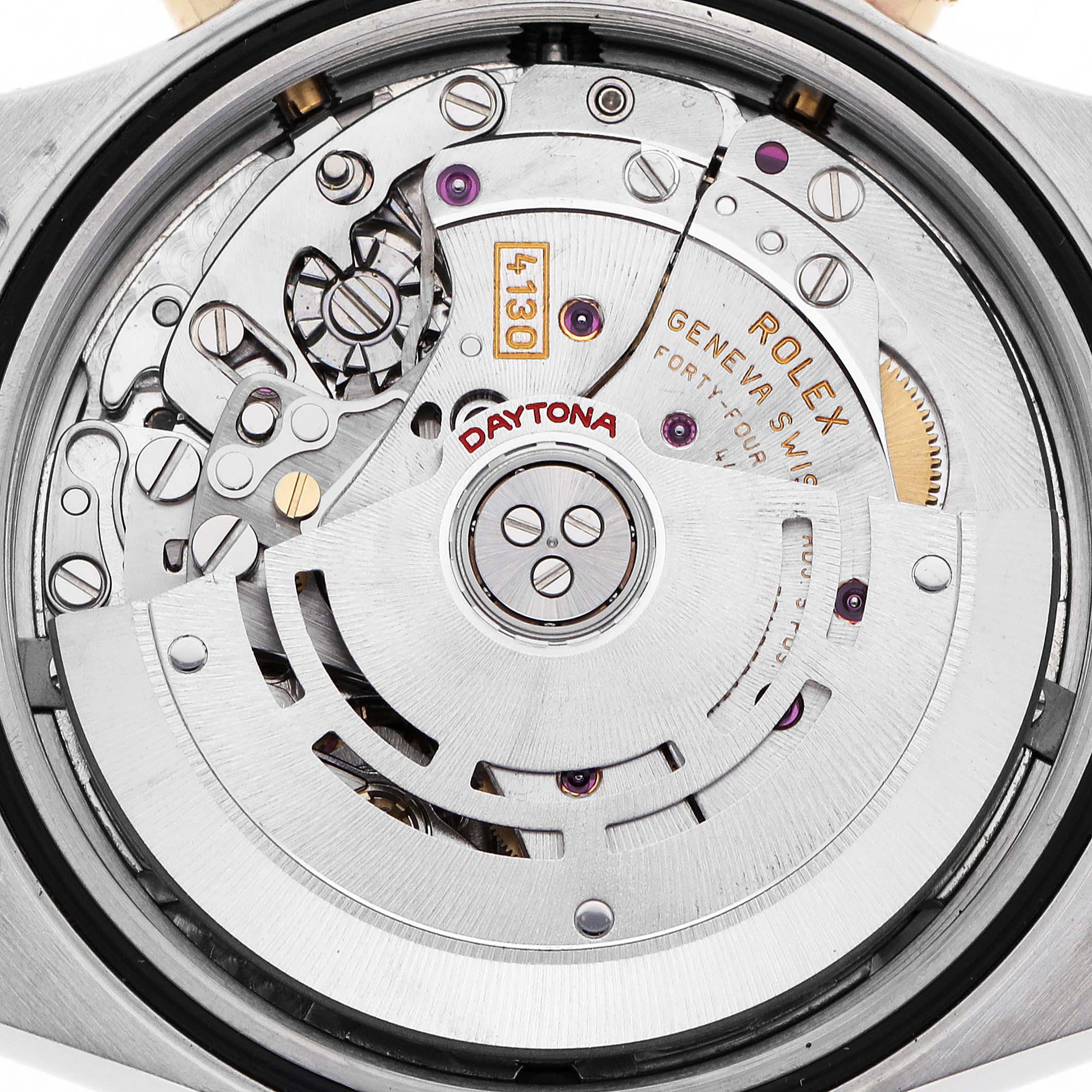 The image shows the movement and internal components of a Rolex Daytona 116523 Men
s Steel and Gold (two tone) Mother of Pearl Dial watch from a top view.