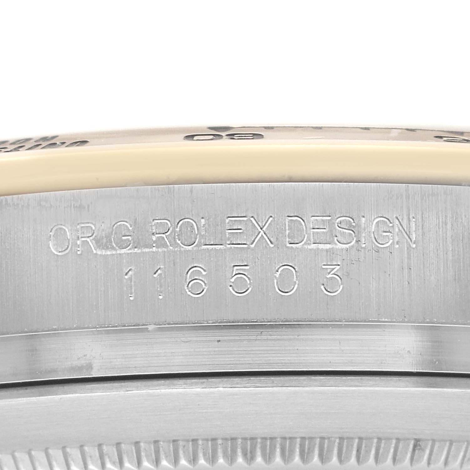The image shows a close-up of the side of a Rolex Daytona 116503 Men
s Steel and Gold (two tone) Mother of Pearl Dial watch case, highlighting the engraved model number and "ORIG ROLEX DESIGN".
