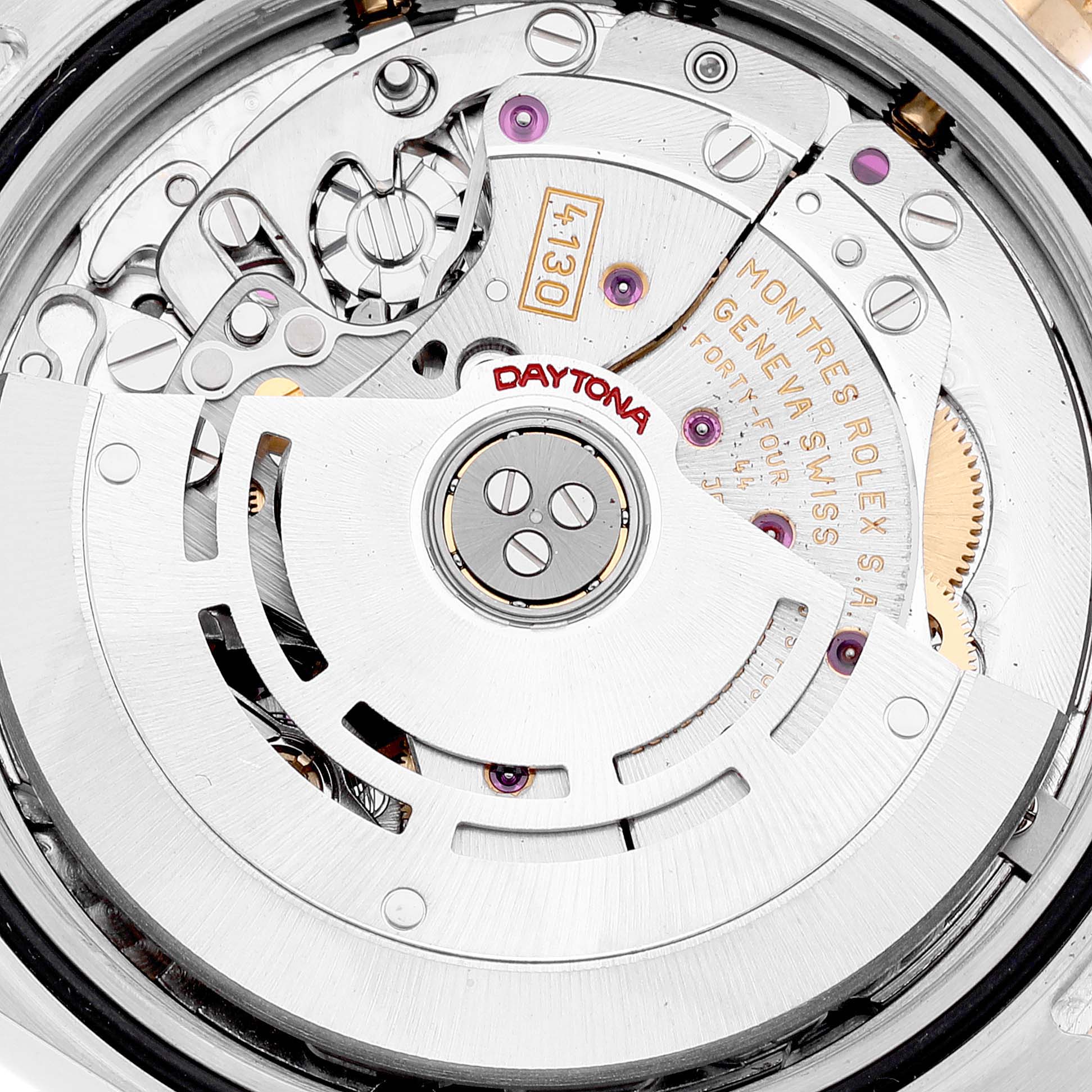 This image shows the intricate internal mechanics and movement of a Rolex Daytona 116523 Men's Steel and Gold (two tone) Silver Dial 116523 Men's Steel and Gold (two tone) Silver Dial watch from a close-up, top-down angle.