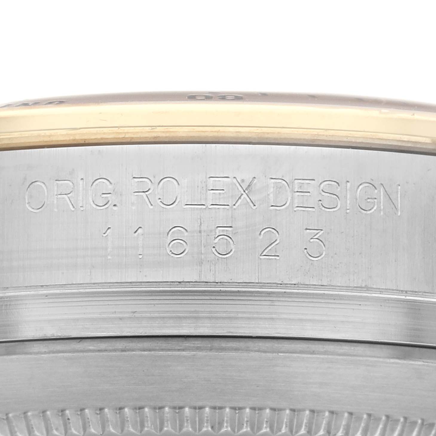 The image shows an engraved side view of a Rolex Daytona 116523 Men's Steel and Gold (two tone) Mother of Pearl Dial 116523 Men's Steel and Gold (two tone) Mother of Pearl Dial watch case with the model number 116523.