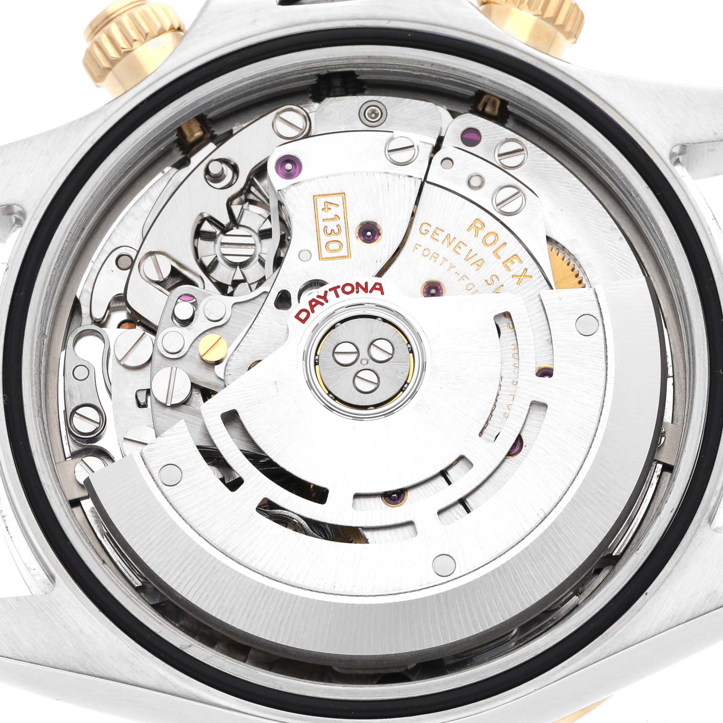 This image shows the movement and inner workings of a Rolex Daytona 116523 Men's Steel and Gold (two tone) Mother of Pearl Dial 116523 Men's Steel and Gold (two tone) Mother of Pearl Dial watch from a back angle.