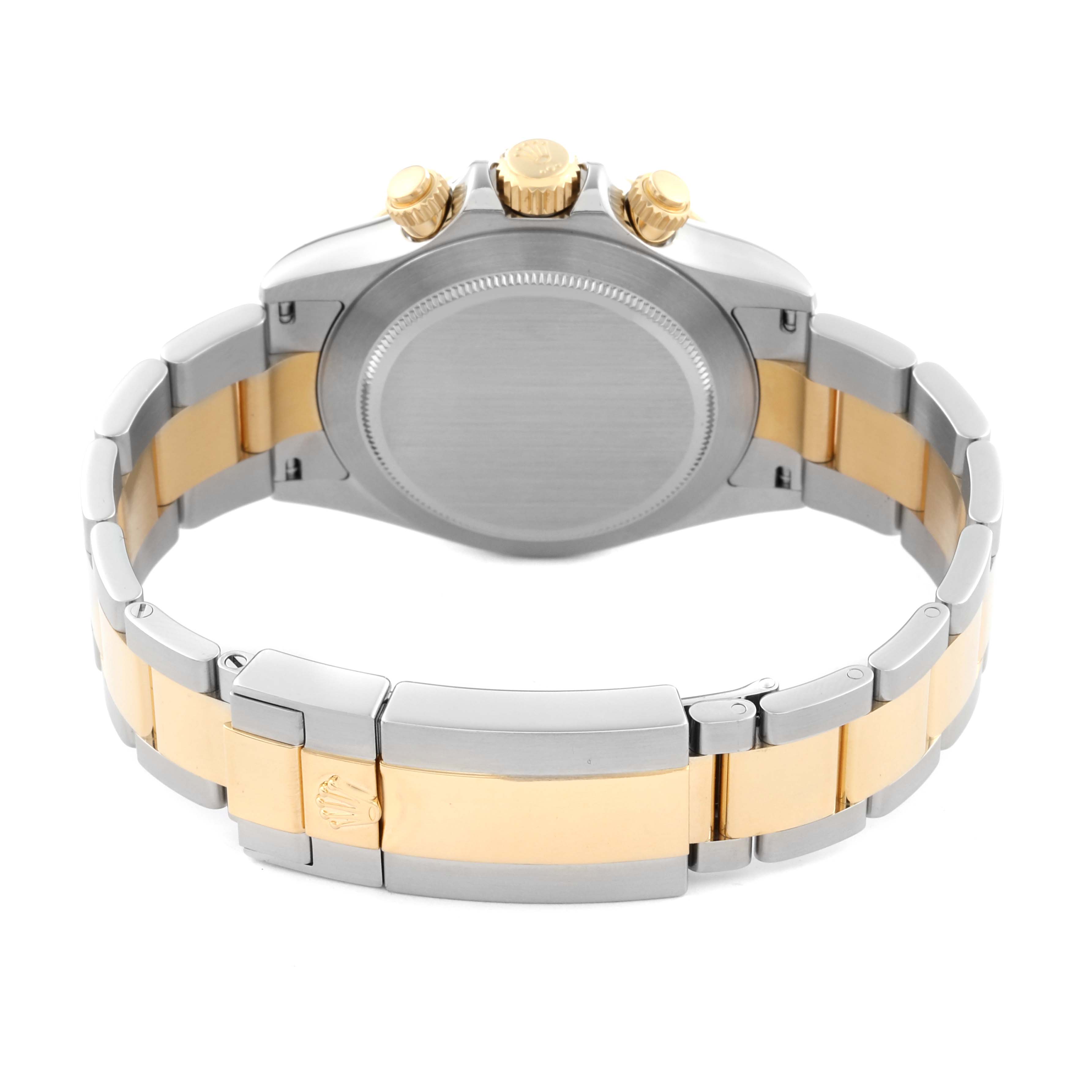 This image shows the back of the Rolex Daytona 116523 Men's Steel and Gold (two tone) Mother of Pearl Dial 116523 Men's Steel and Gold (two tone) Mother of Pearl Dial watch, including its case and two-tone metal bracelet.