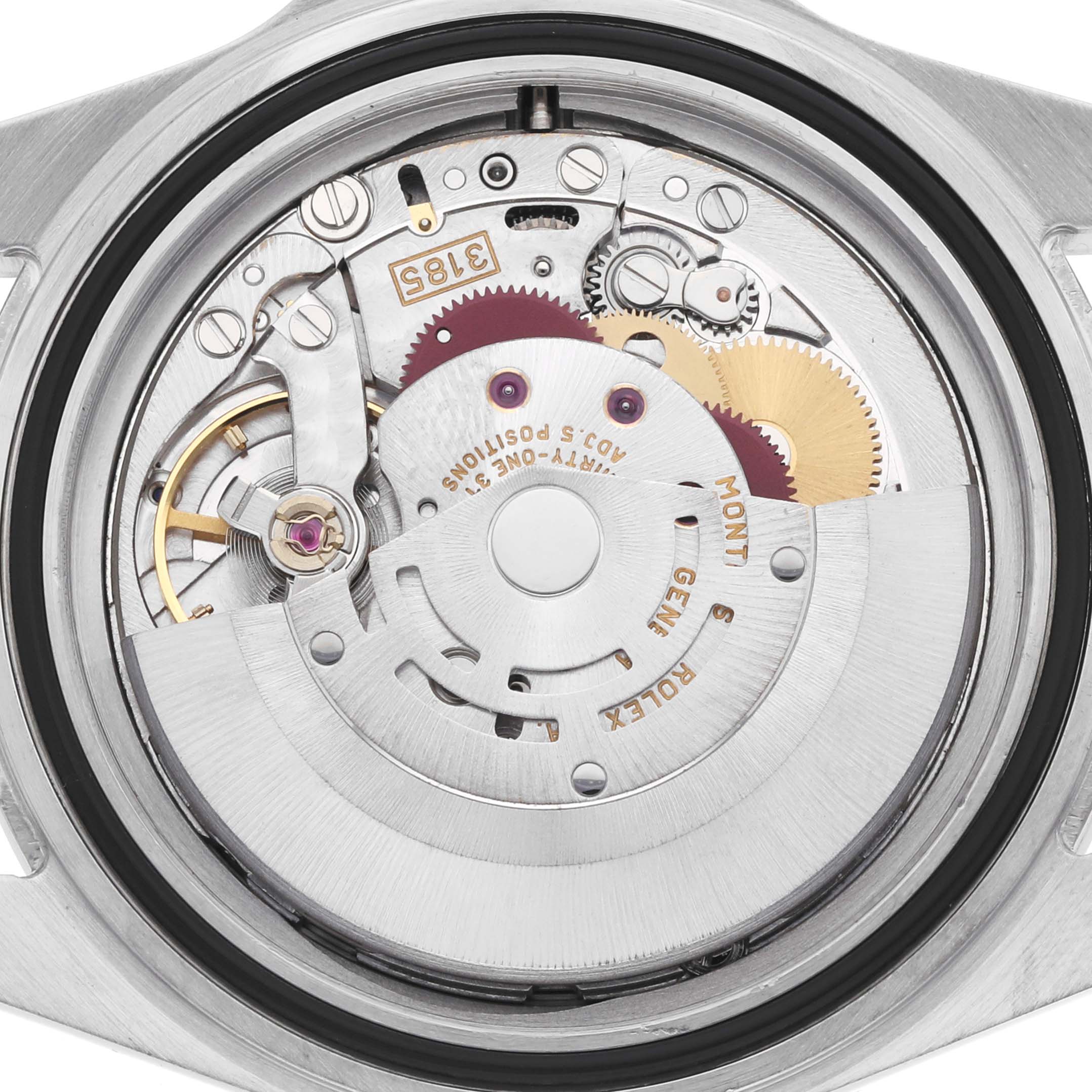 The image shows the movement inside a Rolex Explorer 16570 Men
s Stainless Steel Black Dial watch, highlighting gears, rotors, and mechanical components.
