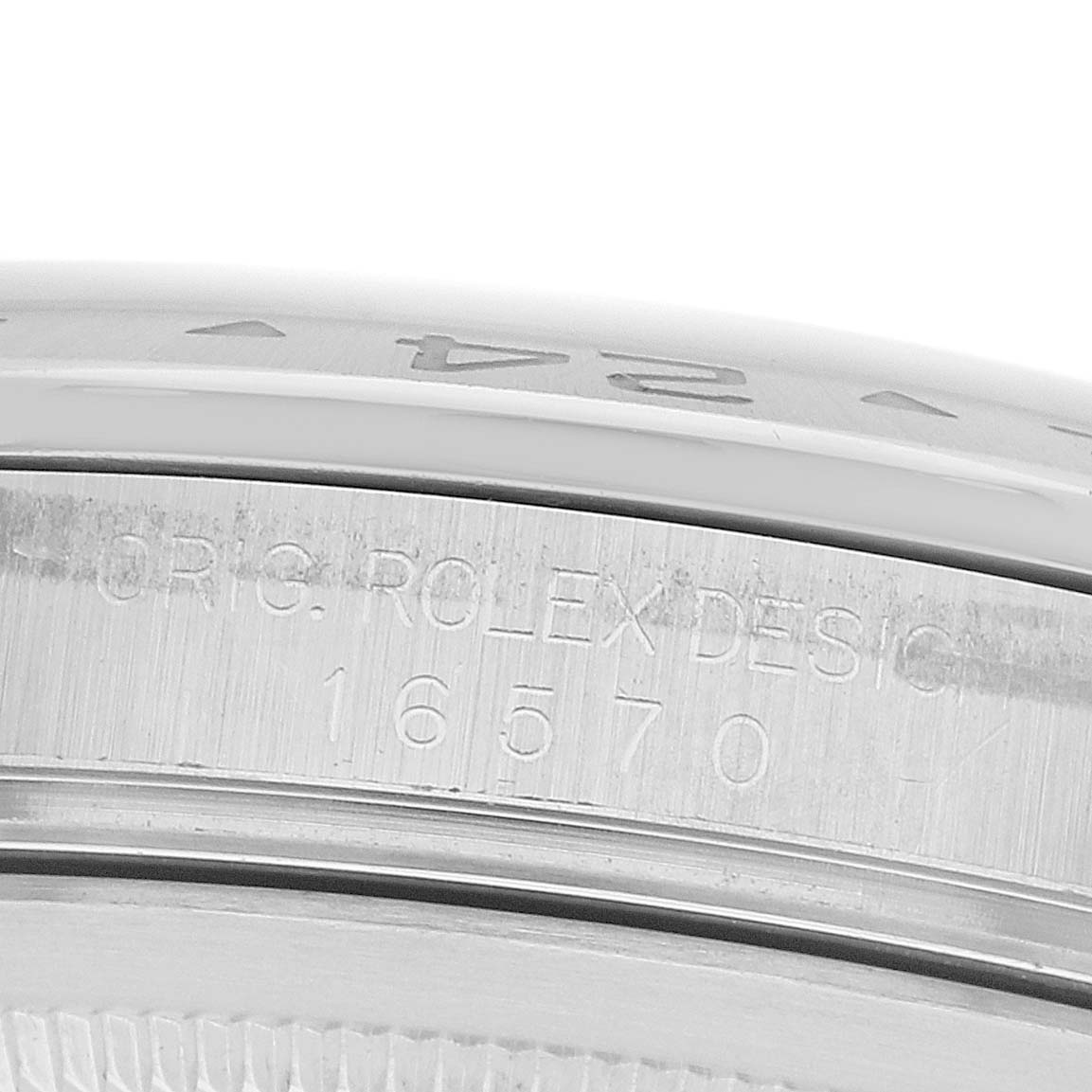 The image shows a close-up side view of the Rolex Explorer 16570 Men
s Stainless Steel Black Dial
s case, focusing on the engraved model number "16570."