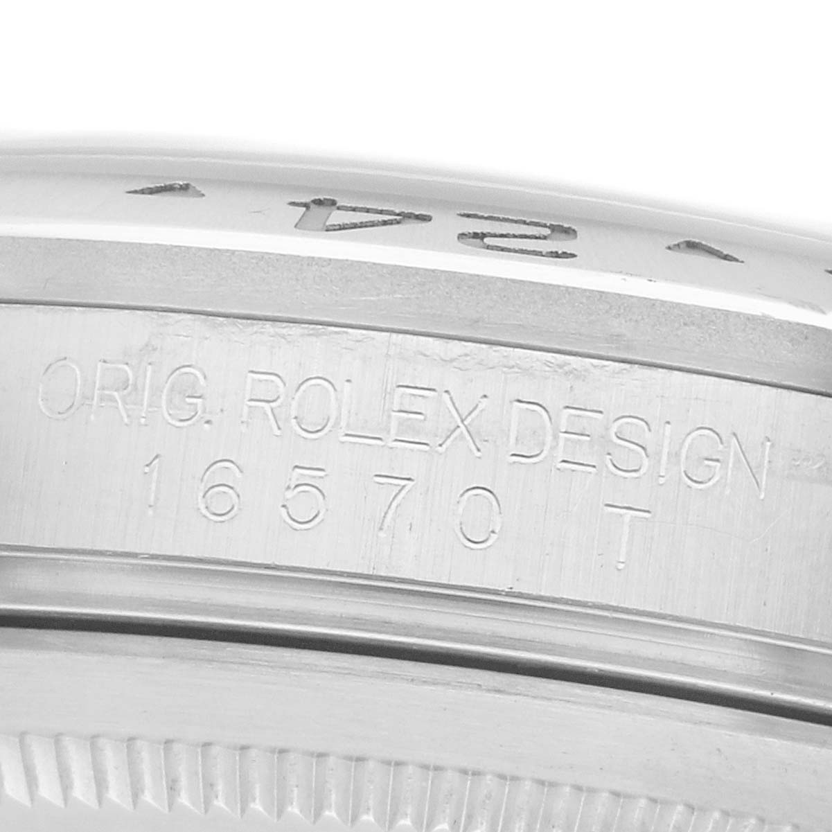 The image shows a close-up of the case engraving for the Rolex Explorer 16570 Men
s Stainless Steel White Dial model, highlighting the design and model number.