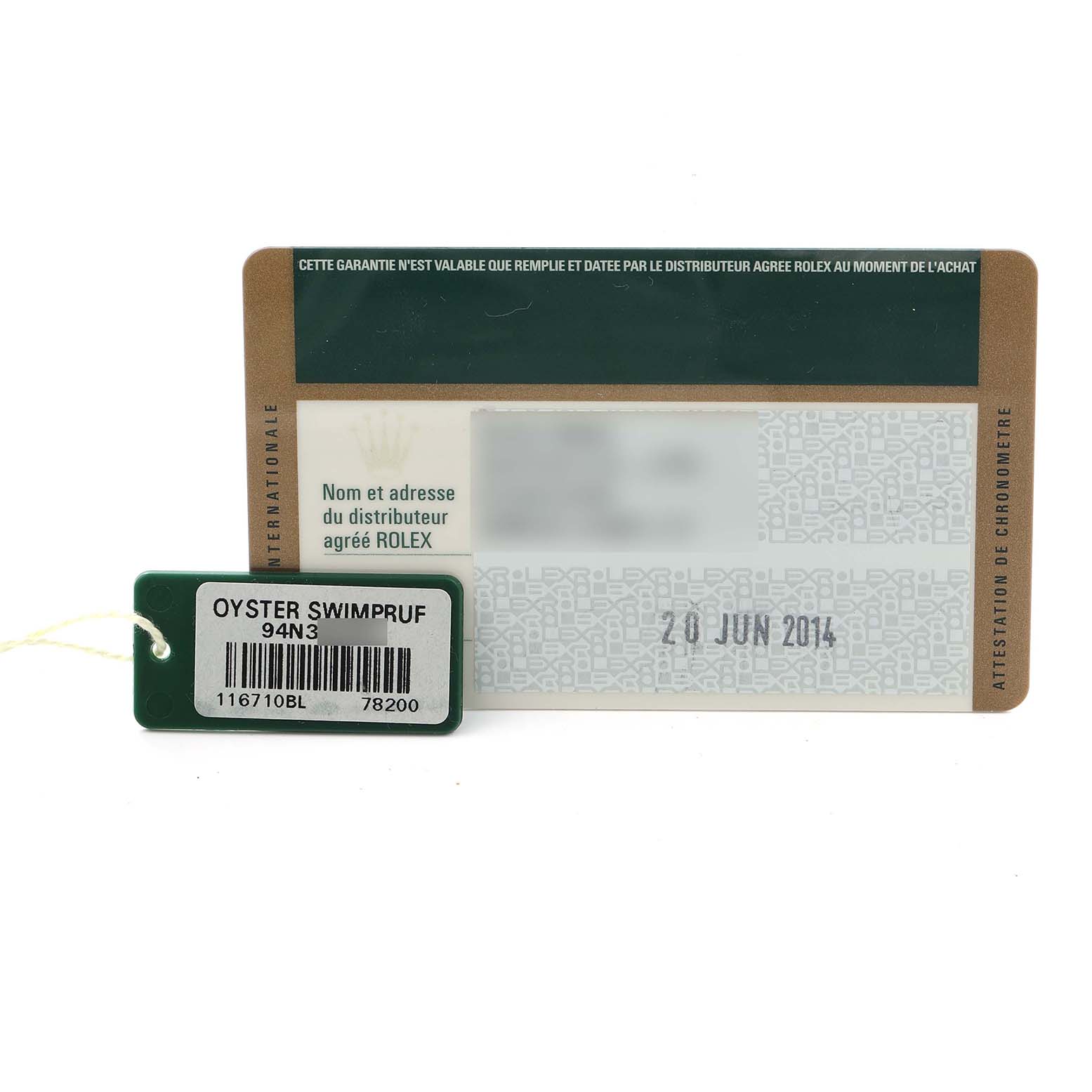 The image shows a warranty card and a tag for a Rolex GMT-Master 116710 Men
s Stainless Steel Black Dial watch, featuring model and date information.