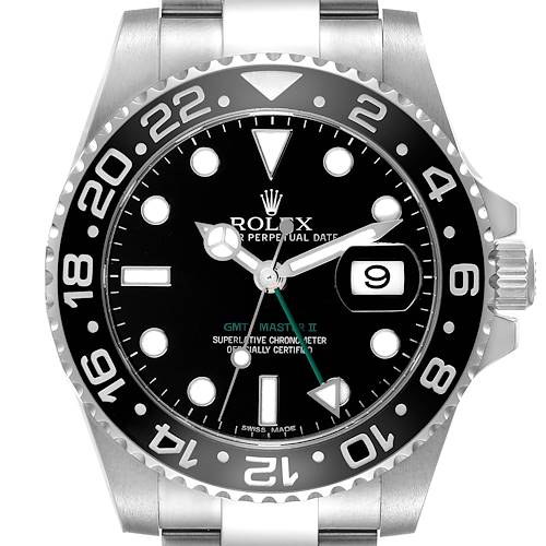 This image shows a Rolex GMT-Master II watch from a top-down angle, highlighting the dial, bezel, and part of the bracelet.