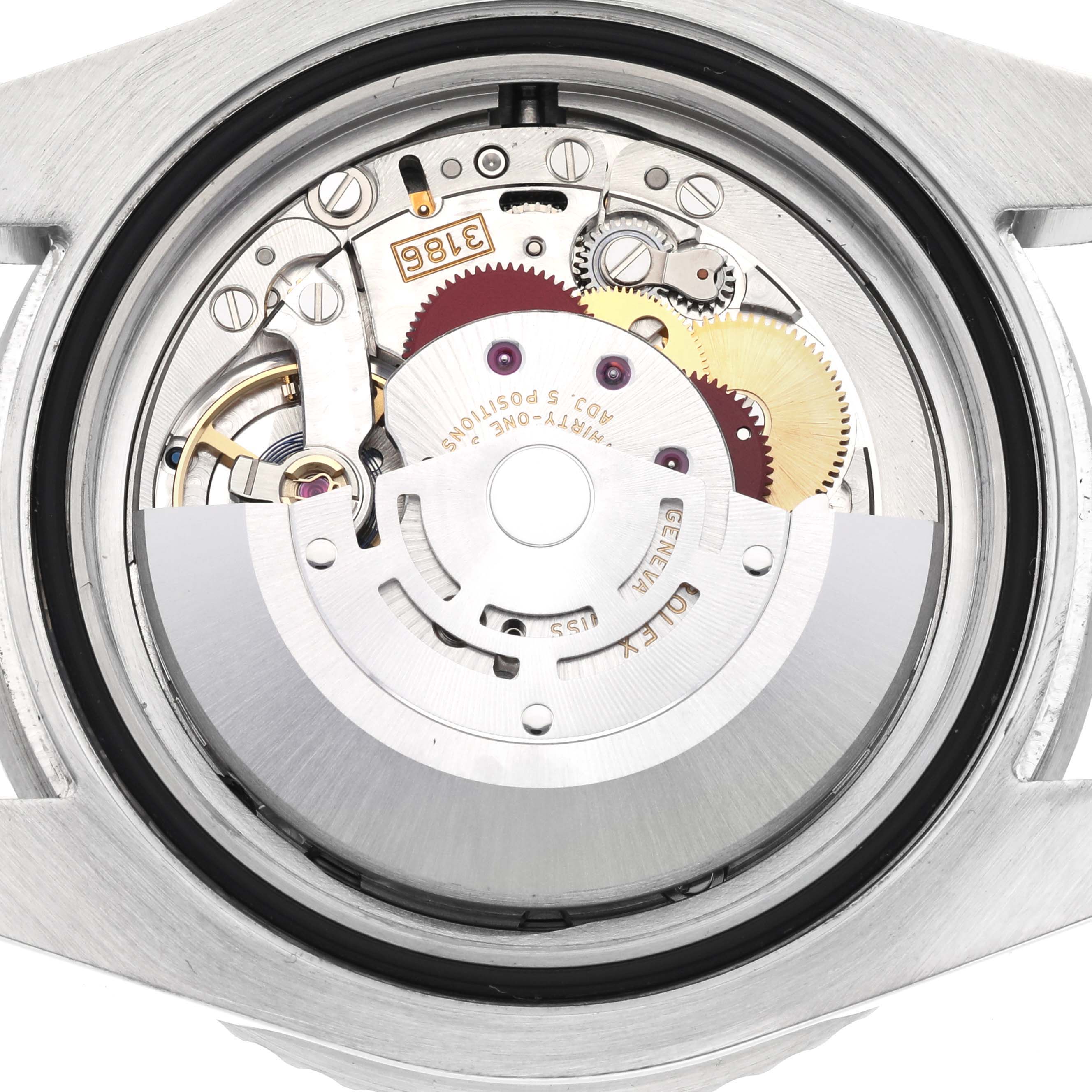 The image shows the internal movement mechanism of a Rolex GMT-Master 116710 Men
s Stainless Steel Black Dial 116710 Men
s Stainless Steel Black Dial watch from a rear angle with the case back removed.