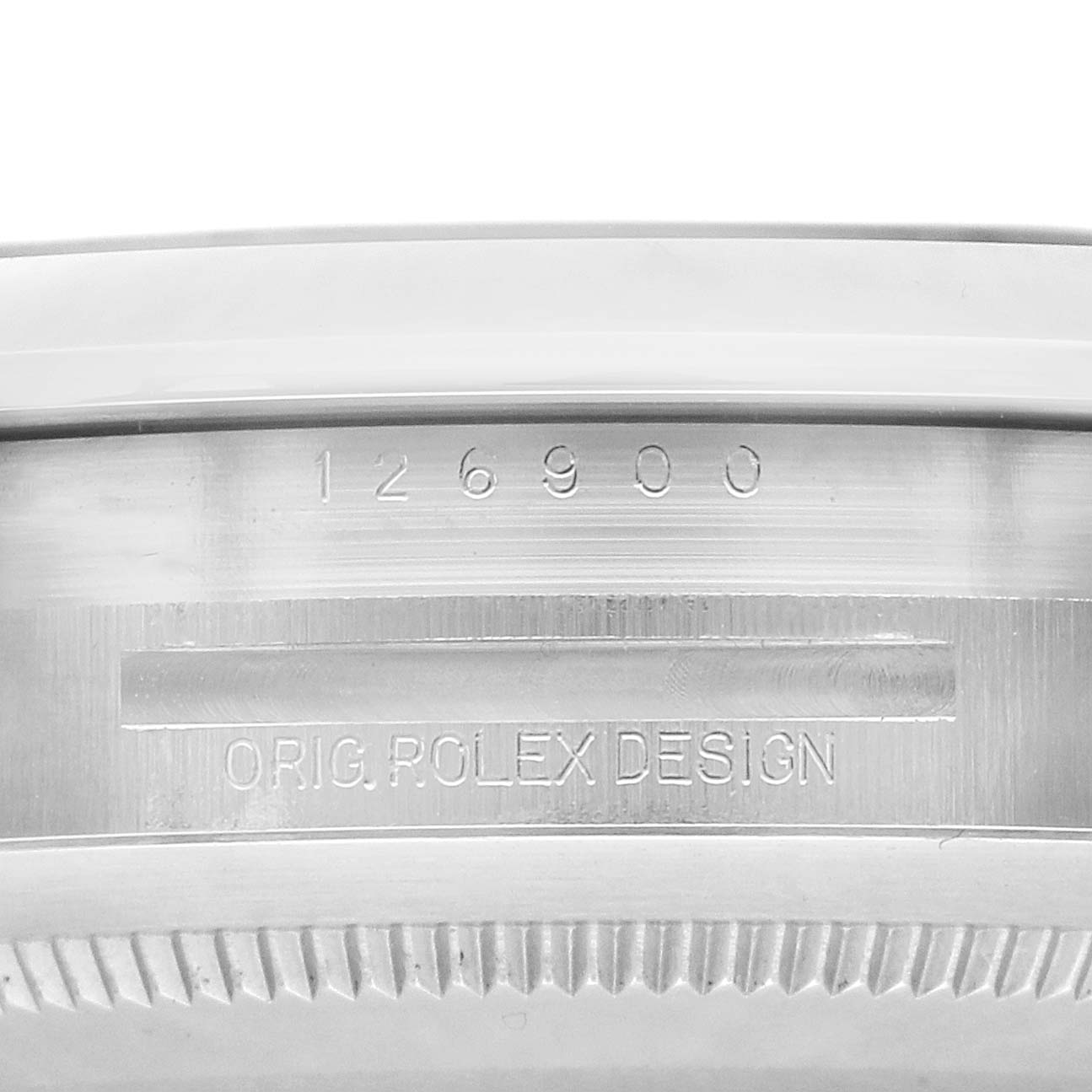 The image shows a detailed, close-up side view of the Rolex Air-King 126900 Men
s Stainless Steel Black Dial model
s case, featuring its model number and design engraving.