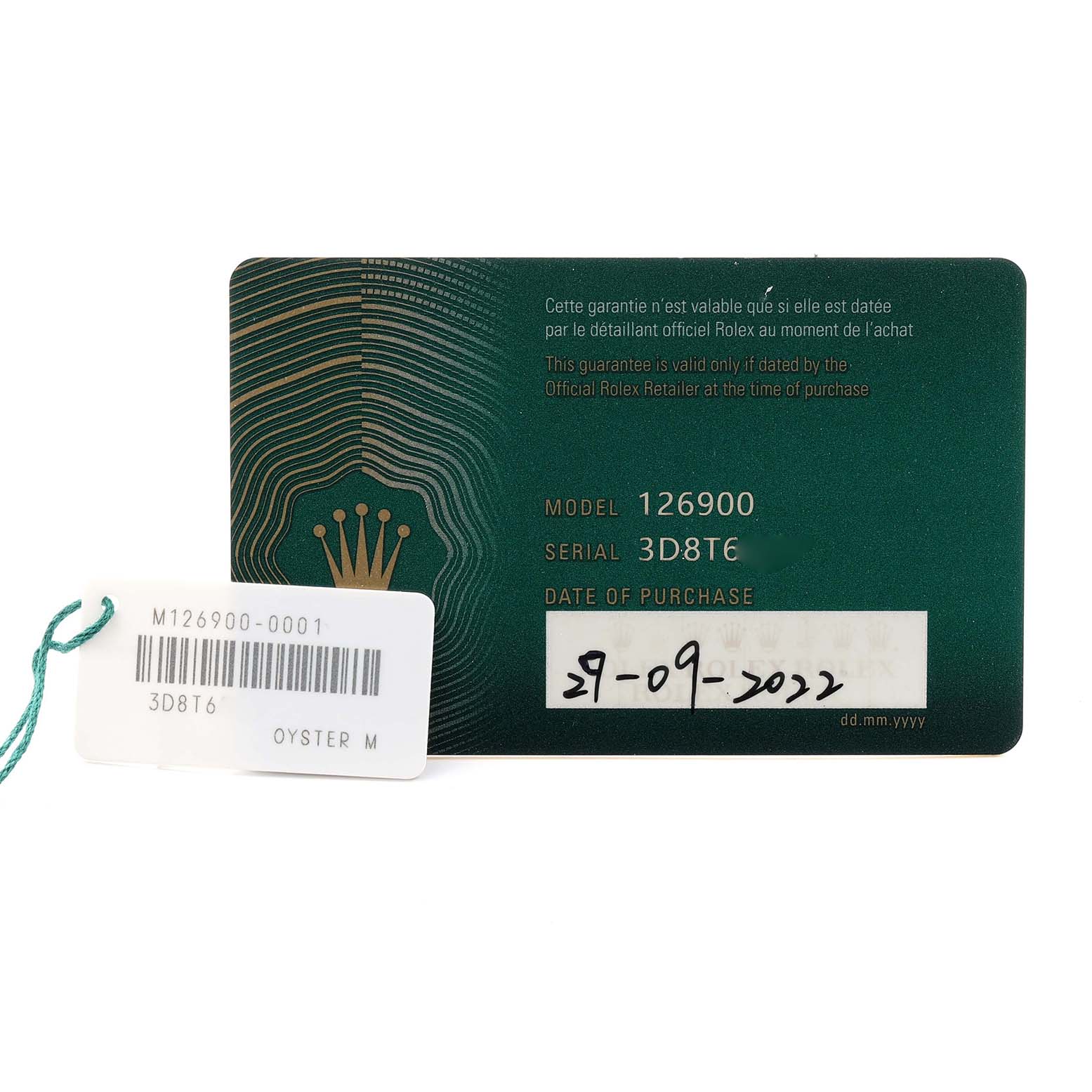 The image shows a warranty card and tag for a Rolex Air-King 126900 Men
s Stainless Steel Black Dial model 126900 with serial number details.