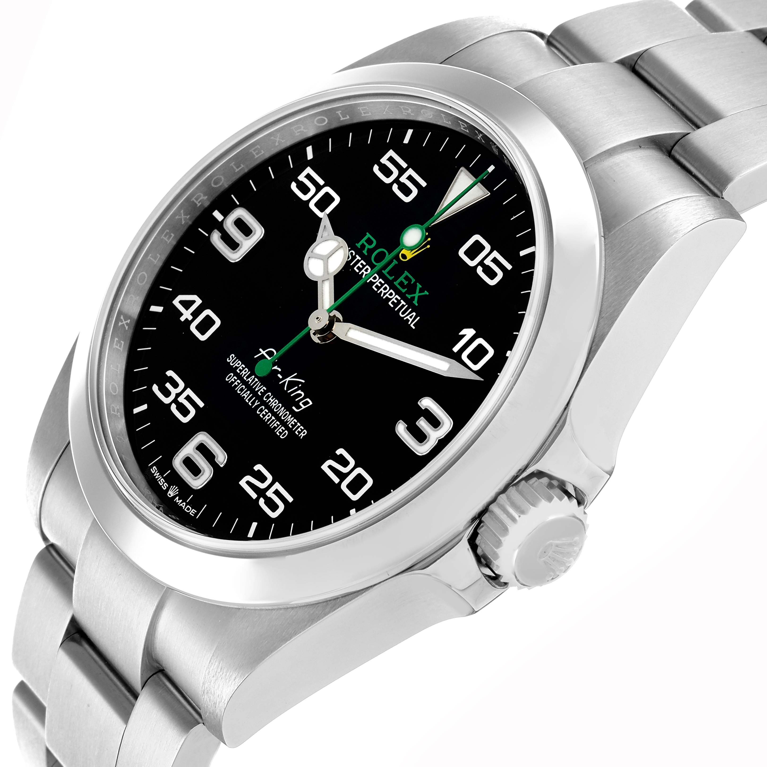 The Rolex Air-King 126900 Men
s Stainless Steel Black Dial is shown from an angled side view, highlighting the dial, bezel, crown, and bracelet.