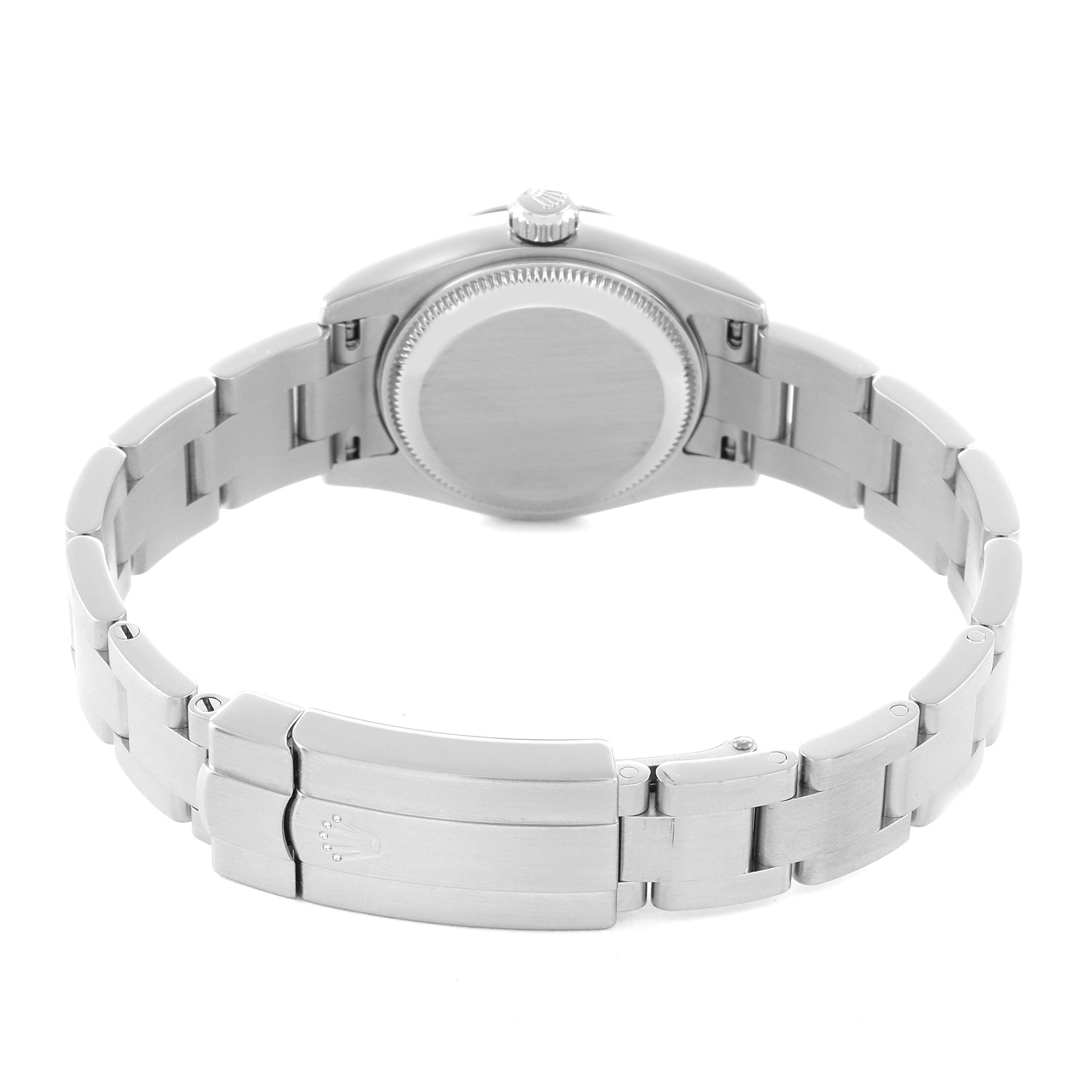 The image shows the back of a Rolex Oyster Perpetual 176200 Women
s Stainless Steel White Dial watch at an angle, highlighting the case back and bracelet clasp.