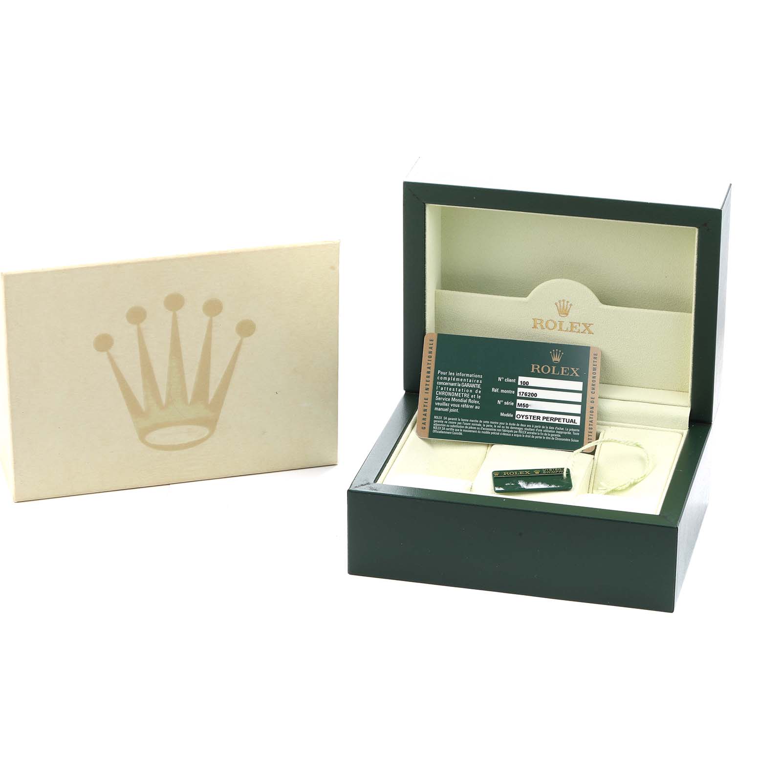 The image shows a Rolex Oyster Perpetual 176200 Women
s Stainless Steel White Dial watch box at a slight angle, with warranty cards and accessories inside.