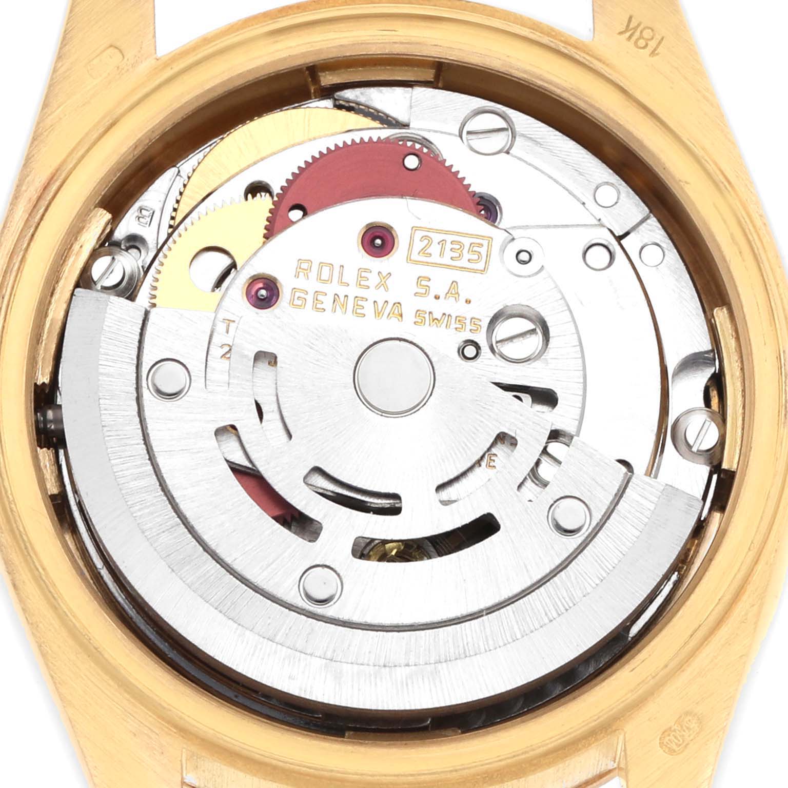 The image shows the movement and mechanism of a Rolex President 69278 Women
s Yellow Gold Champagne Dial watch from a back angle, highlighting the rotor and gears.