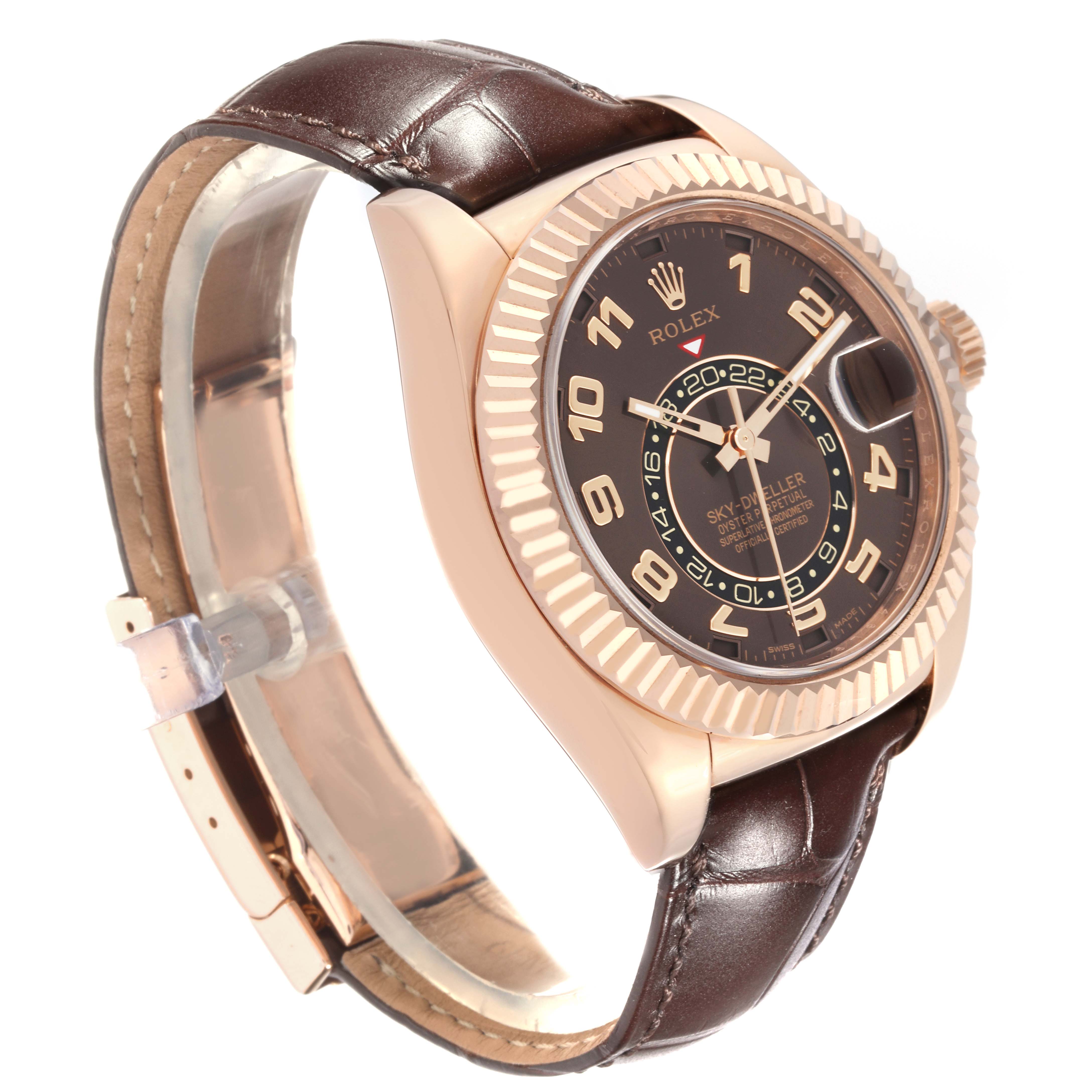 This Rolex Sky-Dweller 326135 Men
s Rose Gold Brown Dial 326135 Men
s Rose Gold Brown Dial watch is shown at a three-quarter angle, displaying its dial, bezel, crown, and leather strap.