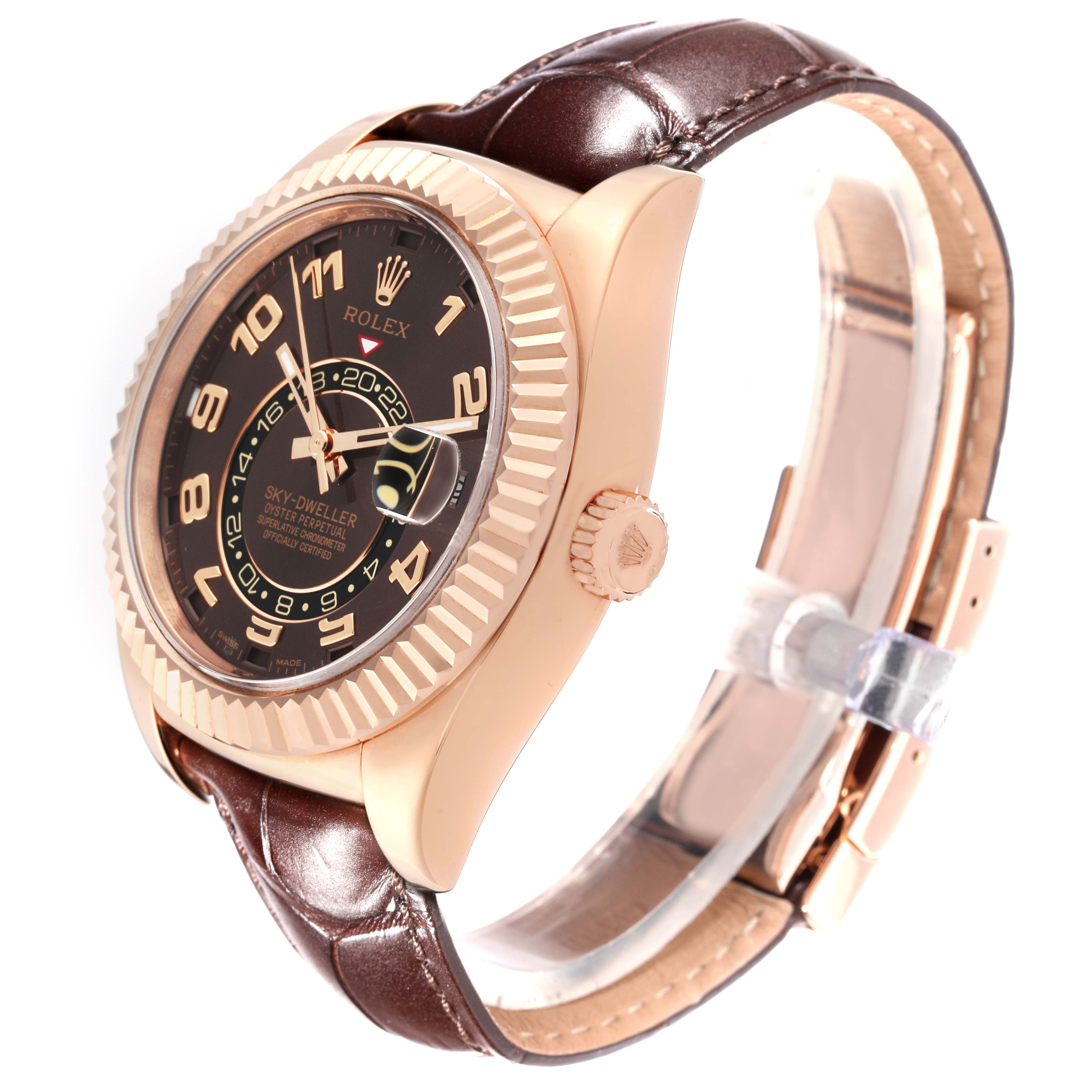 The image shows a Rolex Sky-Dweller 326135 Men
s Rose Gold Brown Dial 326135 Men
s Rose Gold Brown Dial watch at a slight angle, highlighting its bezel, dial, crown, and brown leather strap.