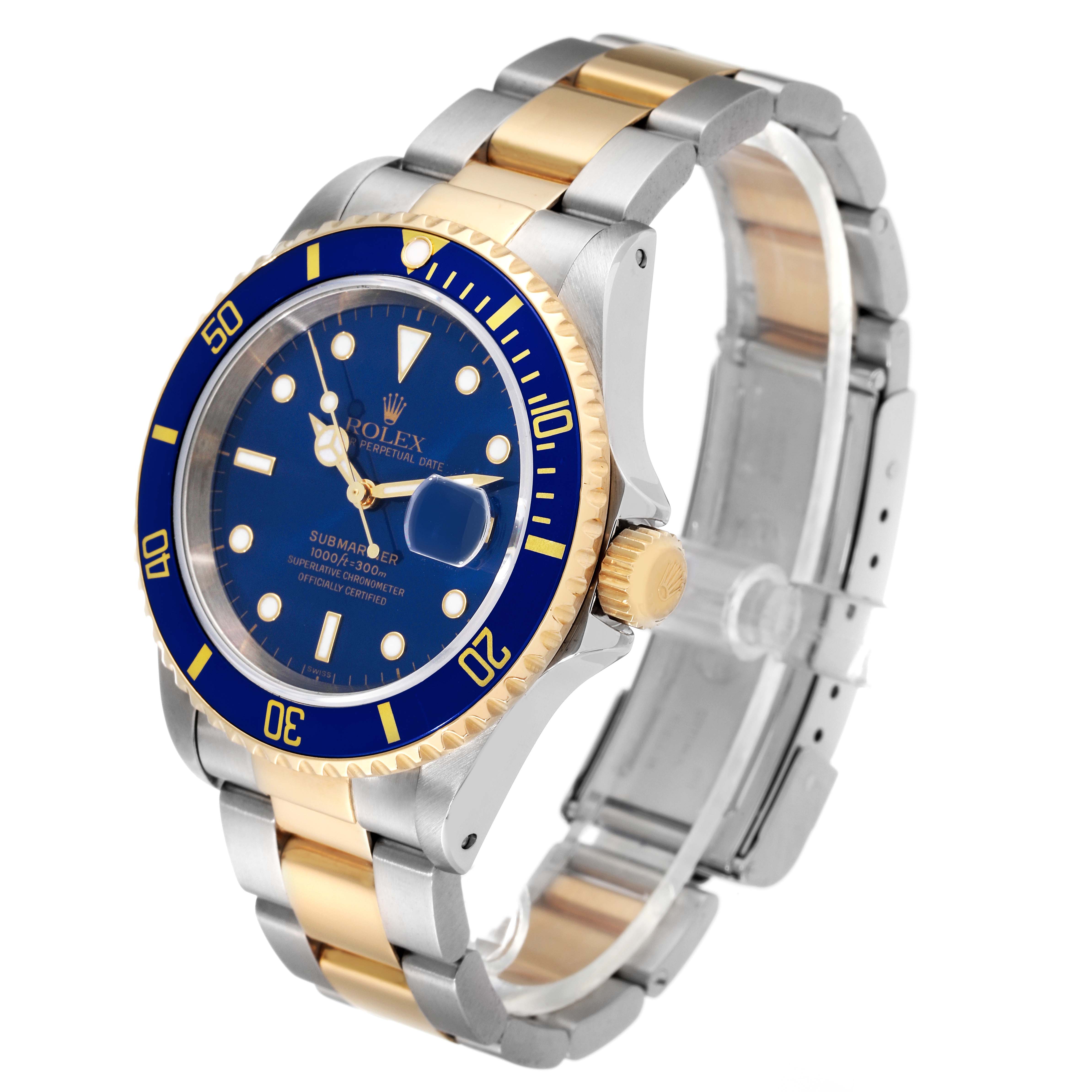 The Rolex Submariner 16613 Men's Steel and Gold (two tone) Blue Dial 16613 Men's Steel and Gold (two tone) Blue Dial watch is shown at an angle displaying its blue dial, bezel, bracelet, and clasp.