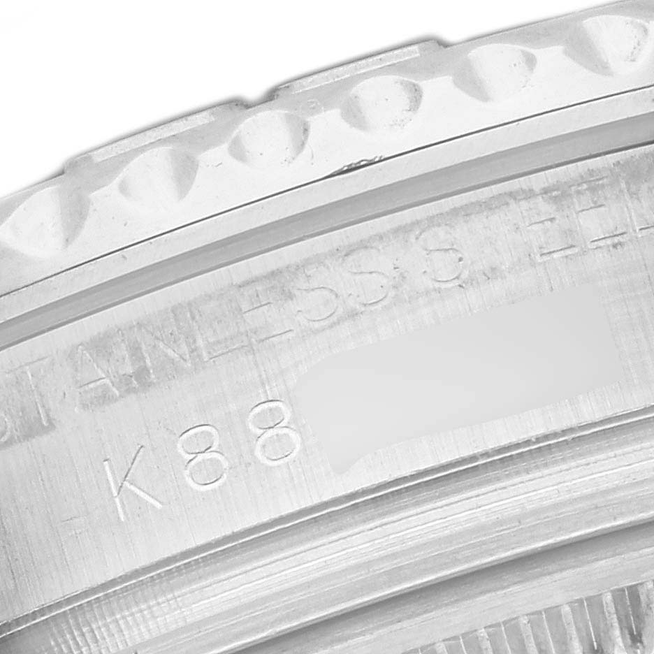This image shows a close-up of the engraved serial number and stainless steel casing of the Rolex Yacht-Master 168622 Men's Stainless Steel Grey Dial 168622 Men's Stainless Steel Grey Dial watch.