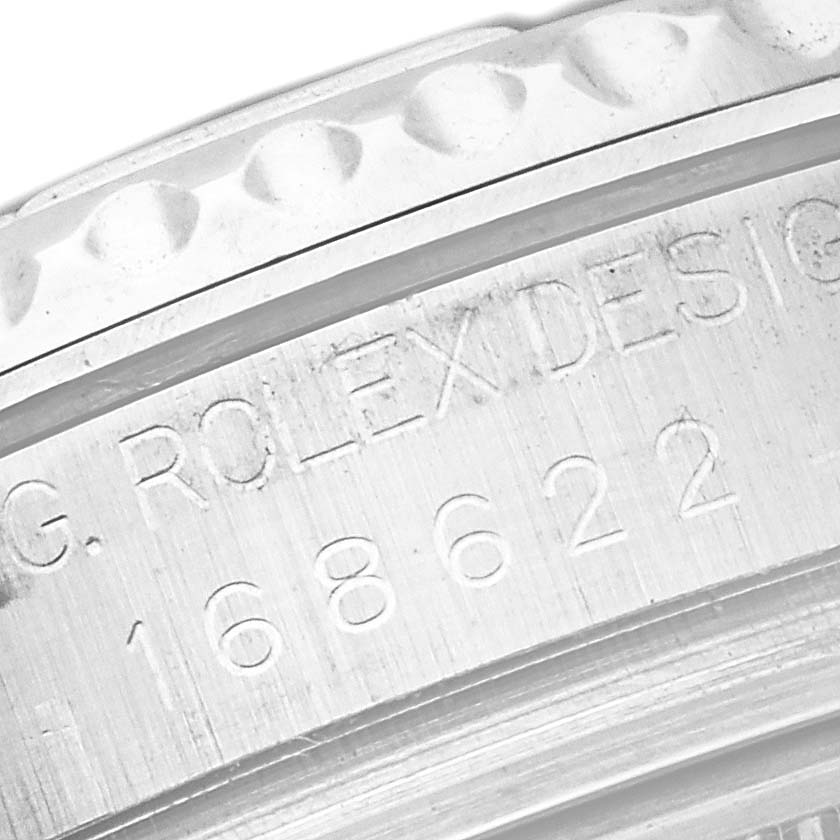 The image shows a close-up of the engraving on the case side of a Rolex Yacht-Master 168622 Men's Stainless Steel Grey Dial 168622 Men's Stainless Steel Grey Dial watch.