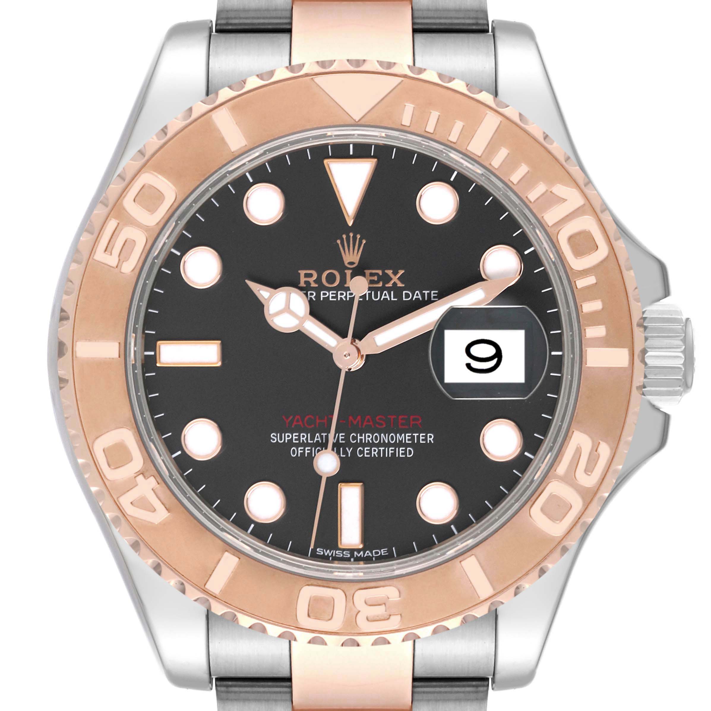 The image shows a front view of a Rolex Yacht-Master 116621 Men's Steel and Gold (two tone) Black Dial 116621 Men's Steel and Gold (two tone) Black Dial watch, highlighting its dial, bezel, and date display.