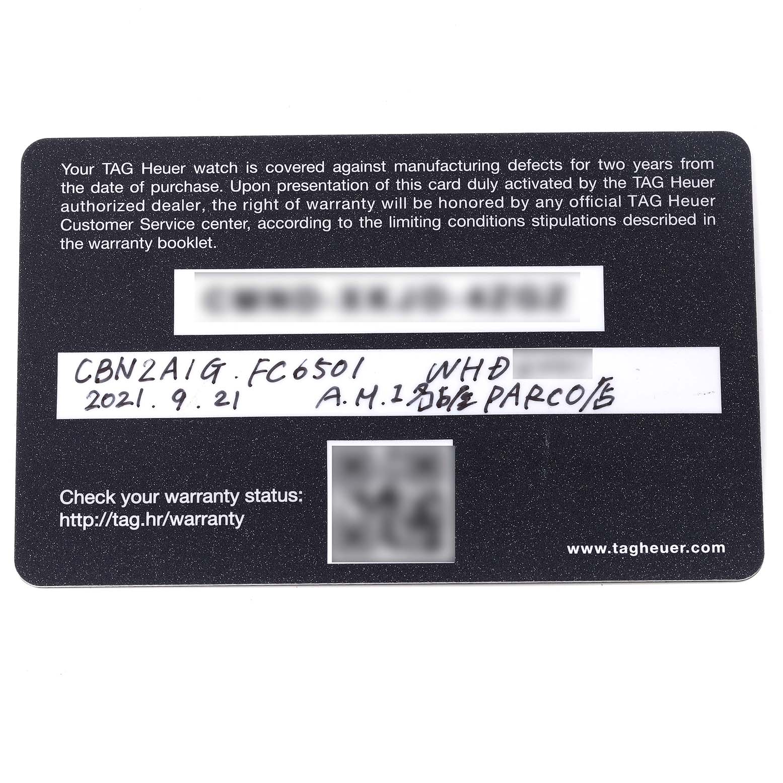 This image shows the warranty card for a Tag Heuer Carrera CBN2A1G.FC6501 Men's Stainless Steel Black Dial CBN2A1G.FC6501 Men's Stainless Steel Black Dial model watch.