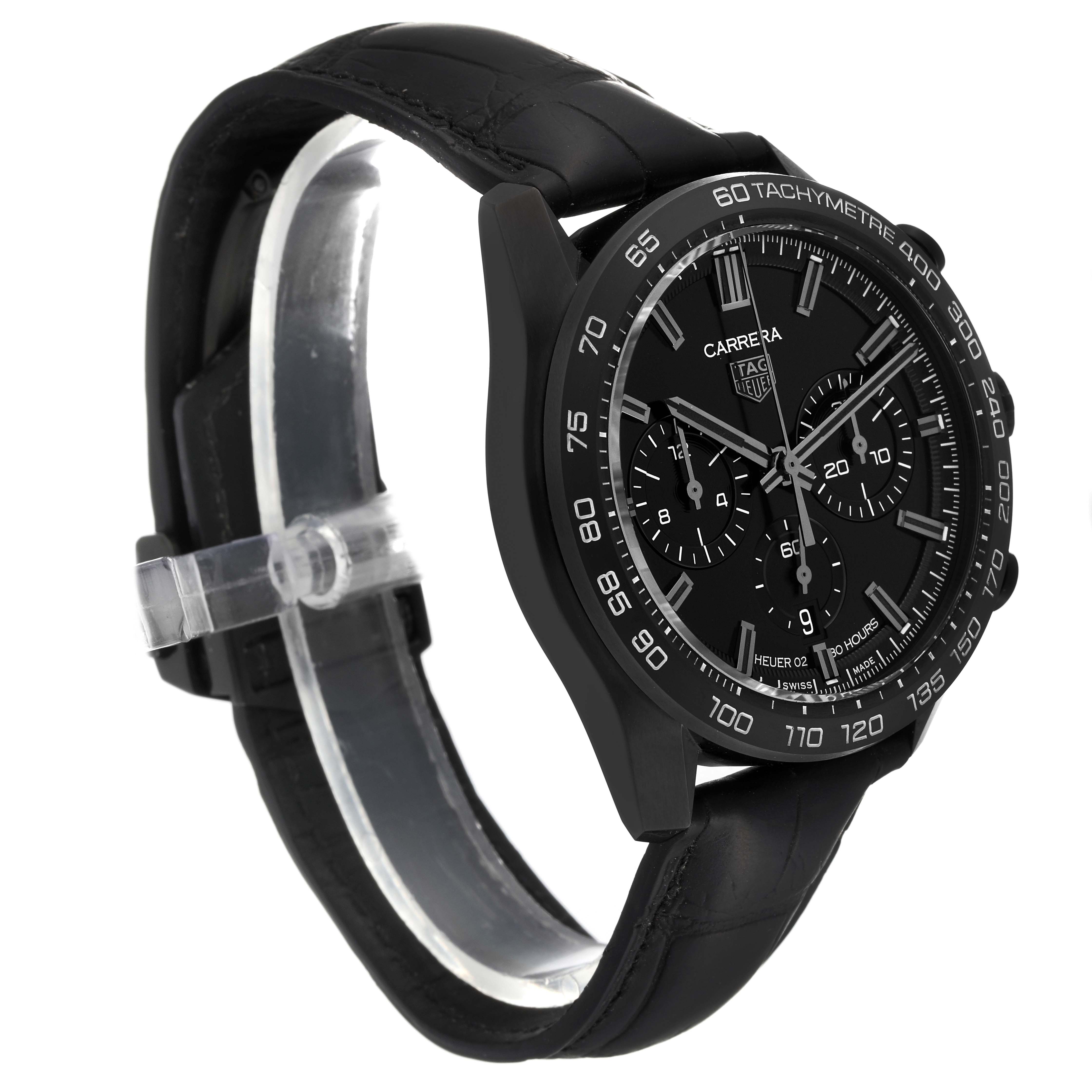 The image shows a side view of the Tag Heuer Carrera CBN2A1G.FC6501 Men's Stainless Steel Black Dial CBN2A1G.FC6501 Men's Stainless Steel Black Dial model watch, highlighting the dark dial, leather strap, and tachymeter bezel.