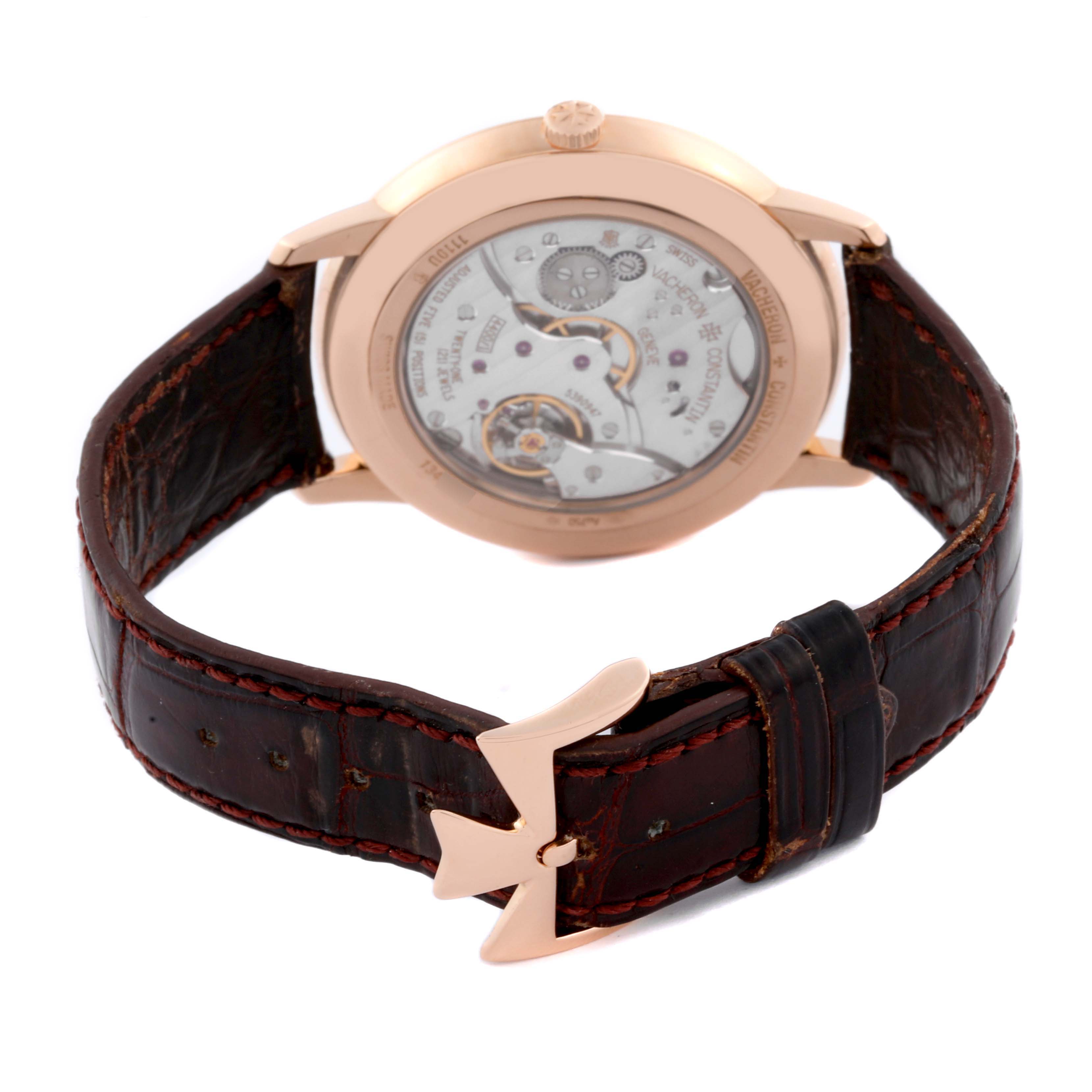 The image shows the back view of the Vacheron Constantin Patrimony 1110U/000R Men's Rose Gold Silver Dial 1110U/000R Men's Rose Gold Silver Dial watch, highlighting its movement and leather strap.