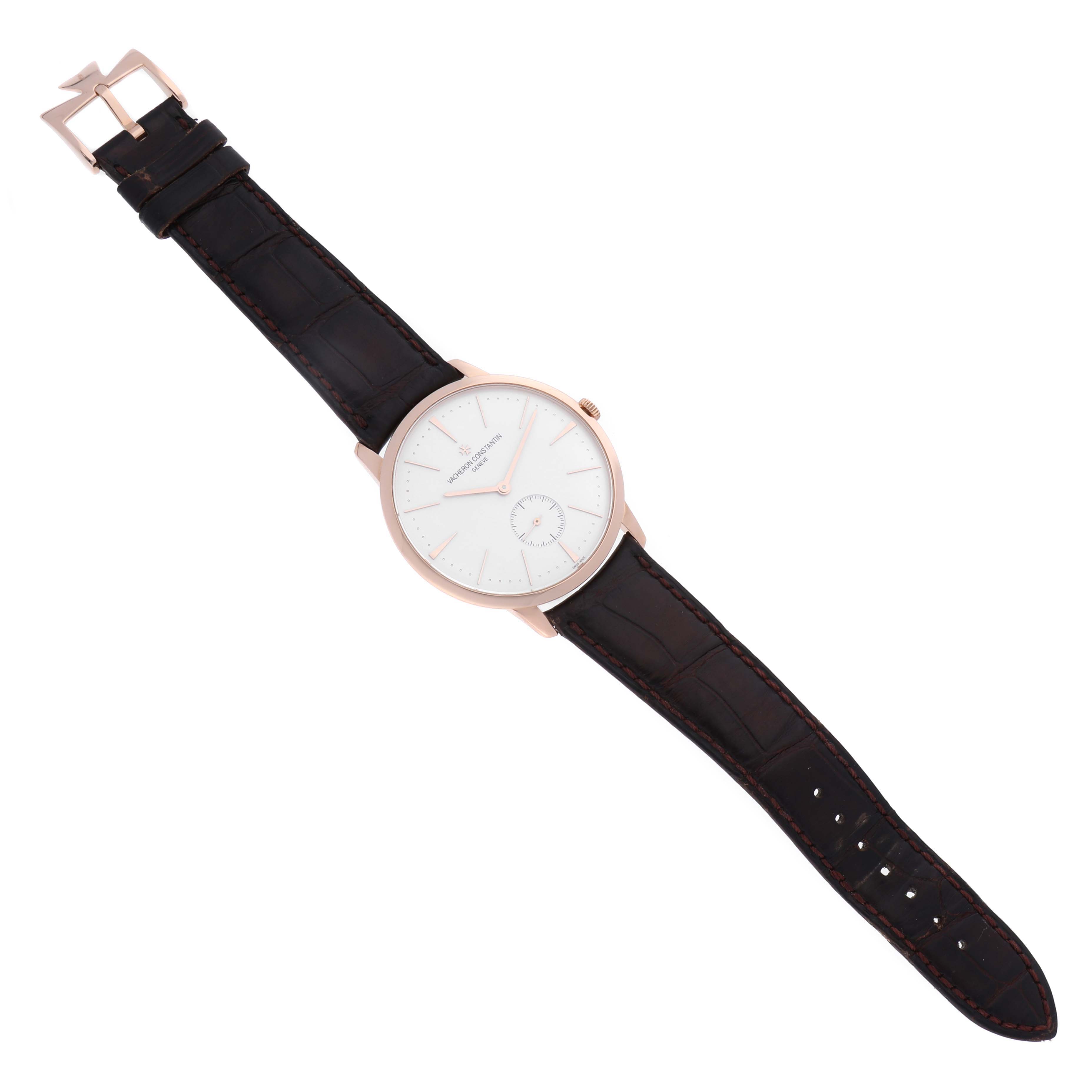 The Vacheron Constantin Patrimony 1110U/000R Men's Rose Gold Silver Dial 1110U/000R Men's Rose Gold Silver Dial watch is shown in a top-down view displaying its dial, case, crown, and leather strap.