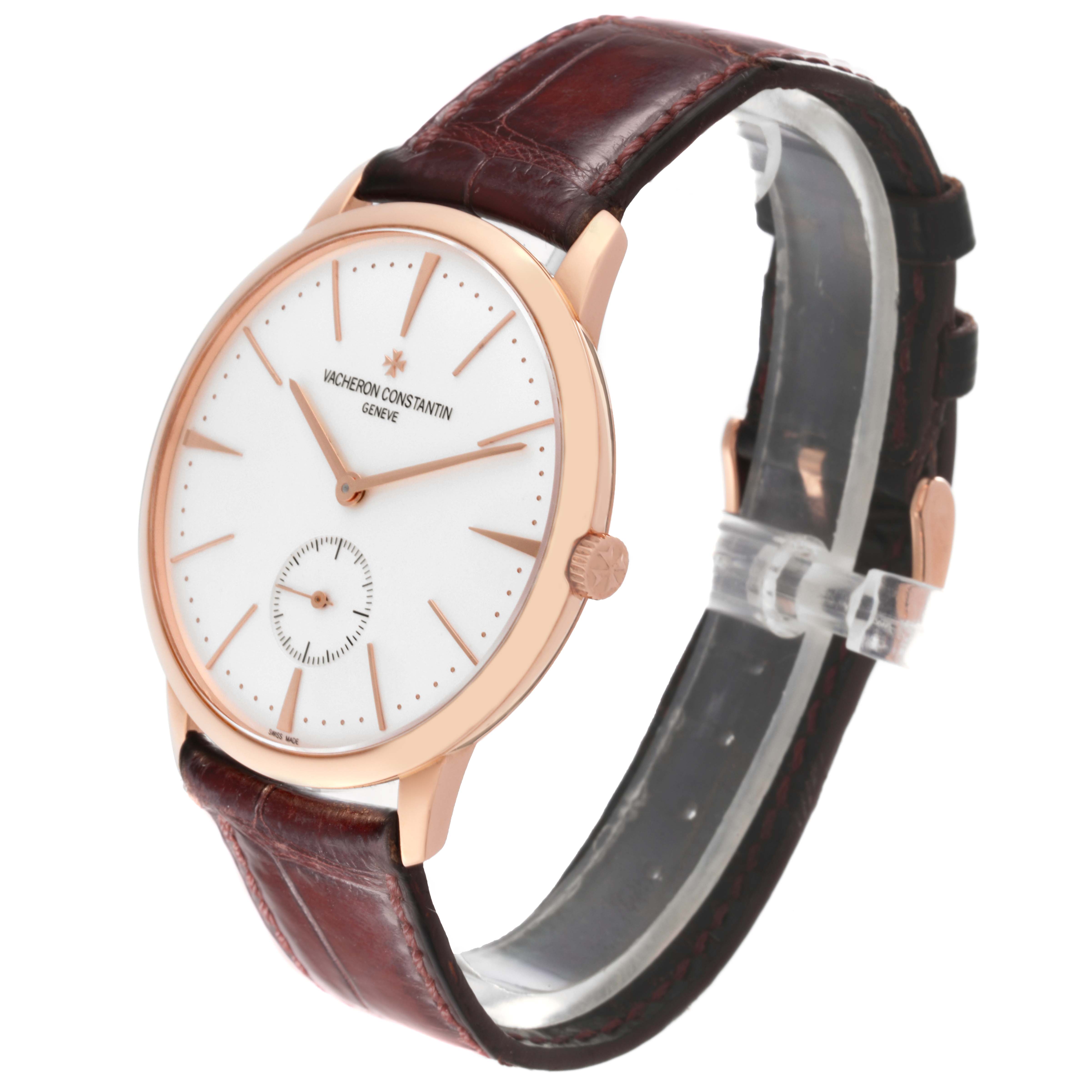 This image shows a side-angle view of the Vacheron Constantin Patrimony 1110U/000R Men's Rose Gold Silver Dial 1110U/000R Men's Rose Gold Silver Dial watch, highlighting its face, case, and leather strap.
