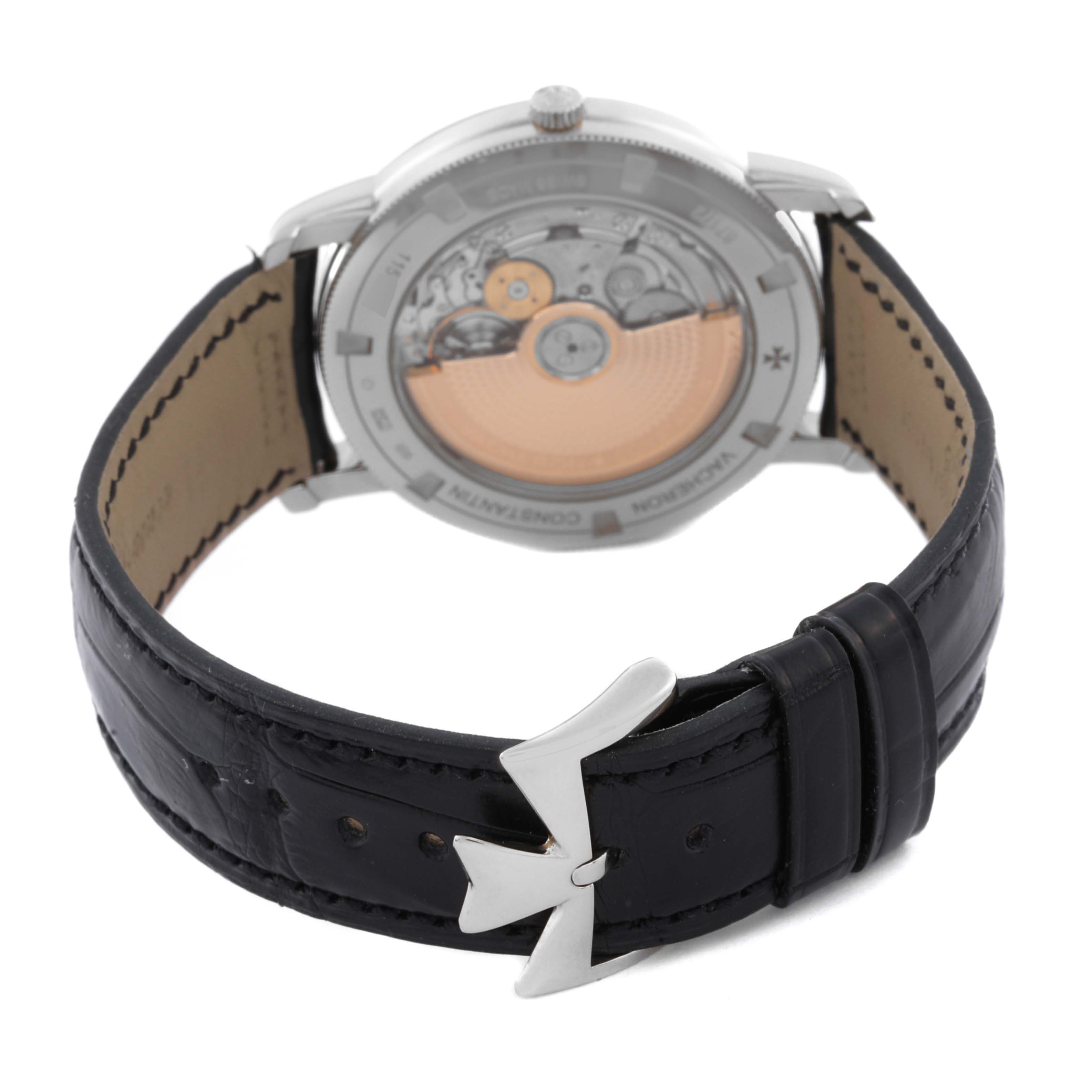 The image shows the back view of a Vacheron Constantin Traditionnelle 87172/000G-9301 Men's White Gold Silver Dial 87172/000G-9301 Men's White Gold Silver Dial watch, showcasing its movement and black leather strap.