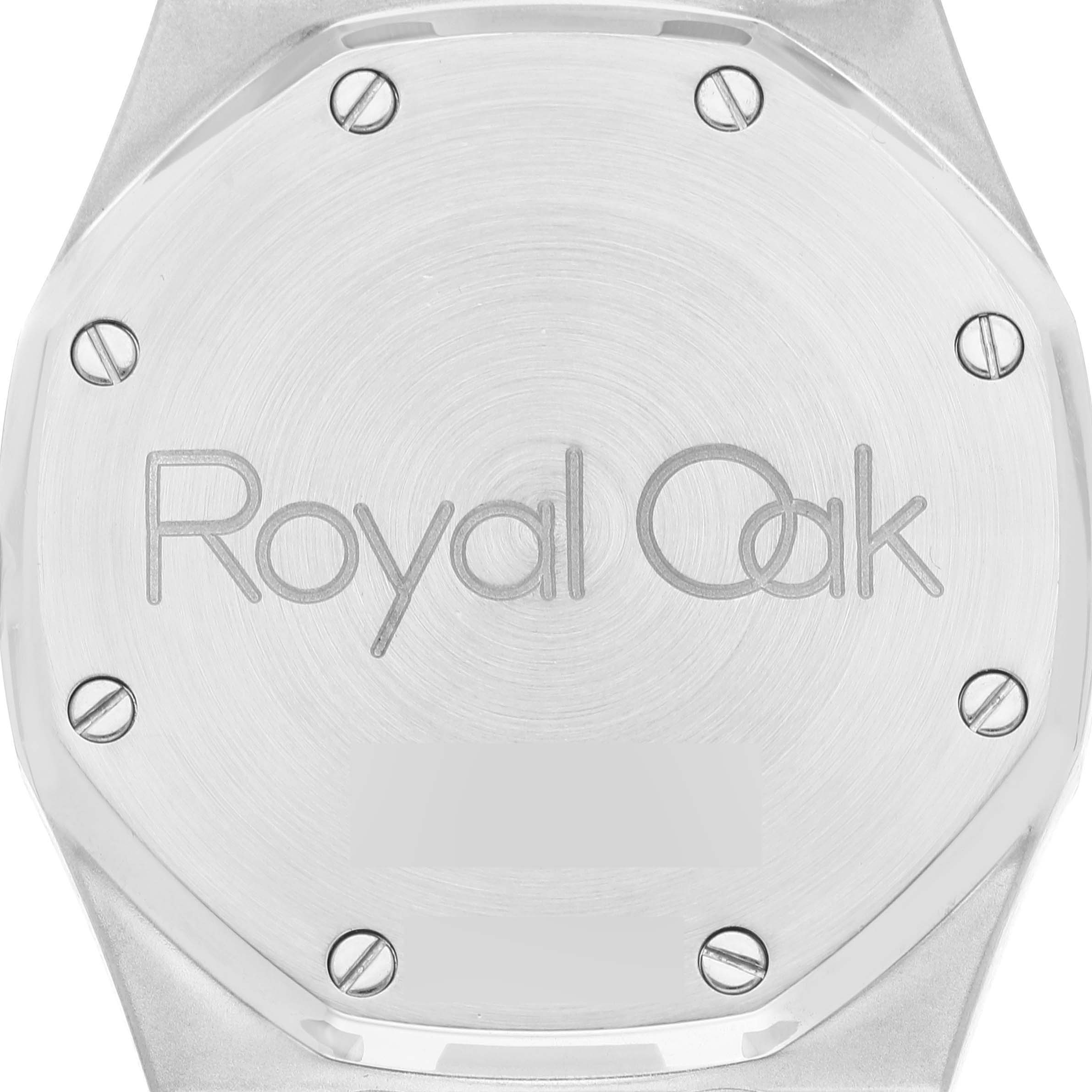 The image shows the back case of an Audemars Piguet Royal Oak 25594ST.OO.0789ST.05 Men's Stainless Steel White Dial 25594ST.OO.0789ST.05 Men's Stainless Steel White Dial watch, highlighting the logo and screws.