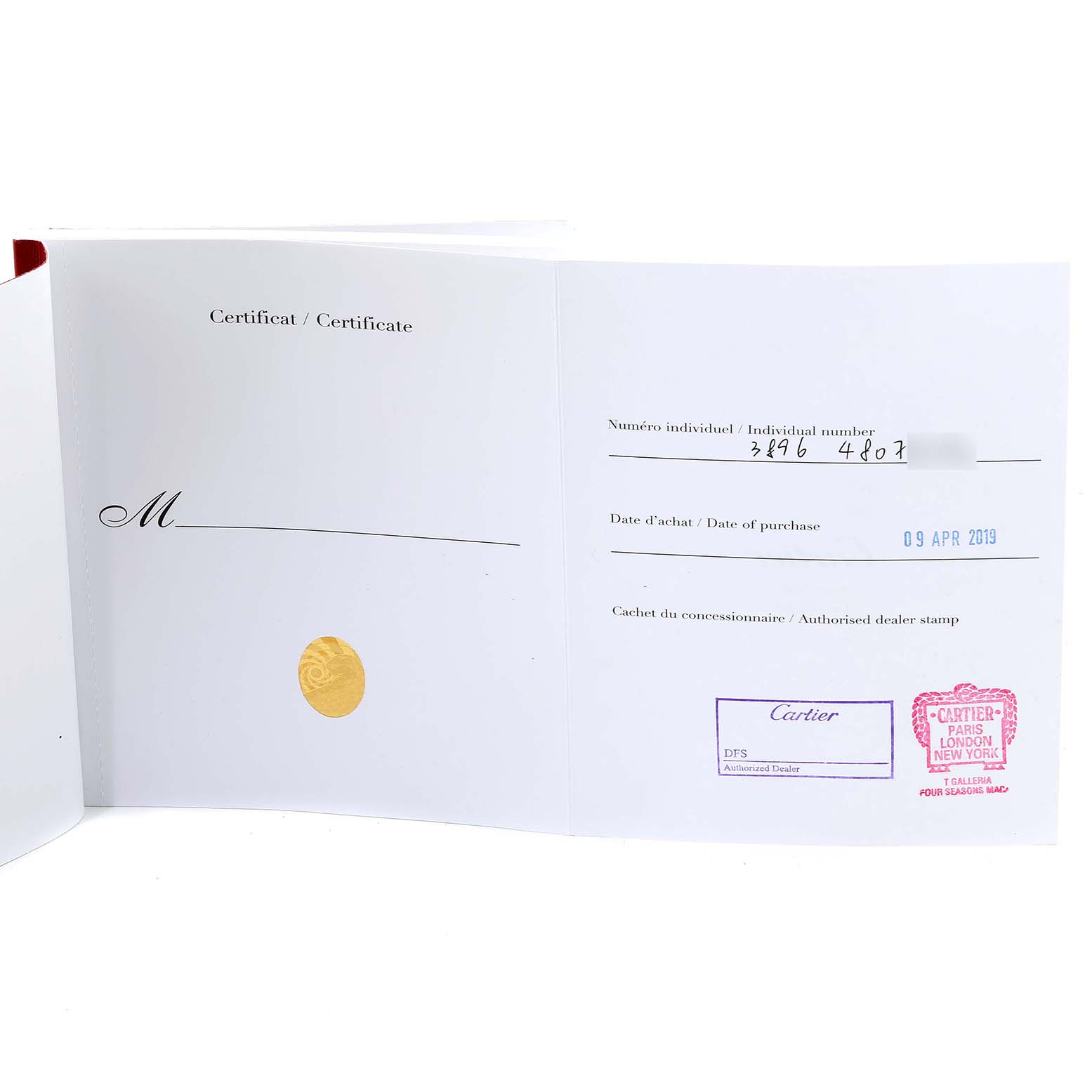 This image shows the open certification booklet for a Cartier Ballon Bleu W2BB0004 Men's Steel and Gold (two tone) Silver Dial W2BB0004 Men's Steel and Gold (two tone) Silver Dial watch, displaying purchase details and dealer stamps.