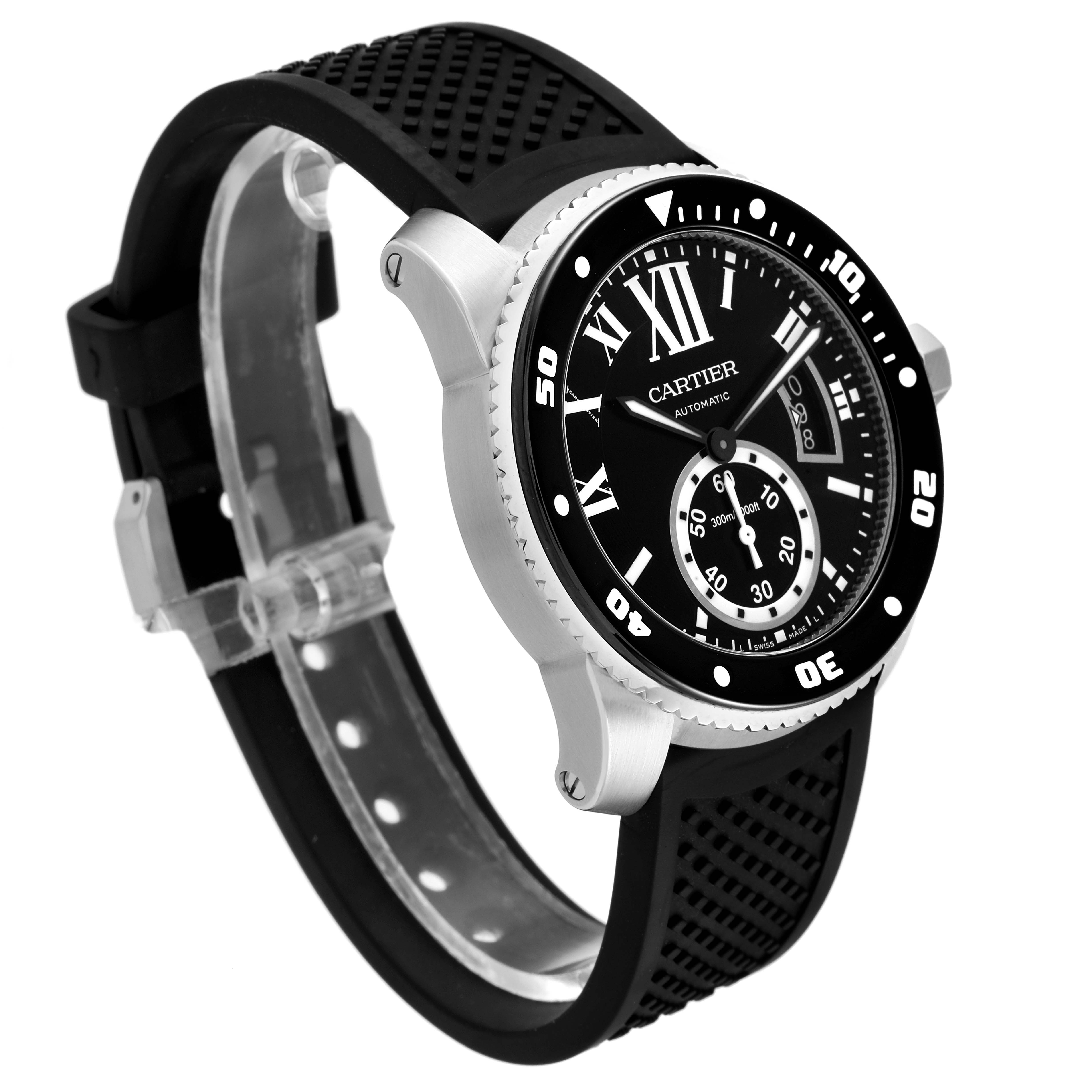 The image shows a Calibre de Cartier watch by Cartier from a front-side angle, highlighting its face and rubber strap.