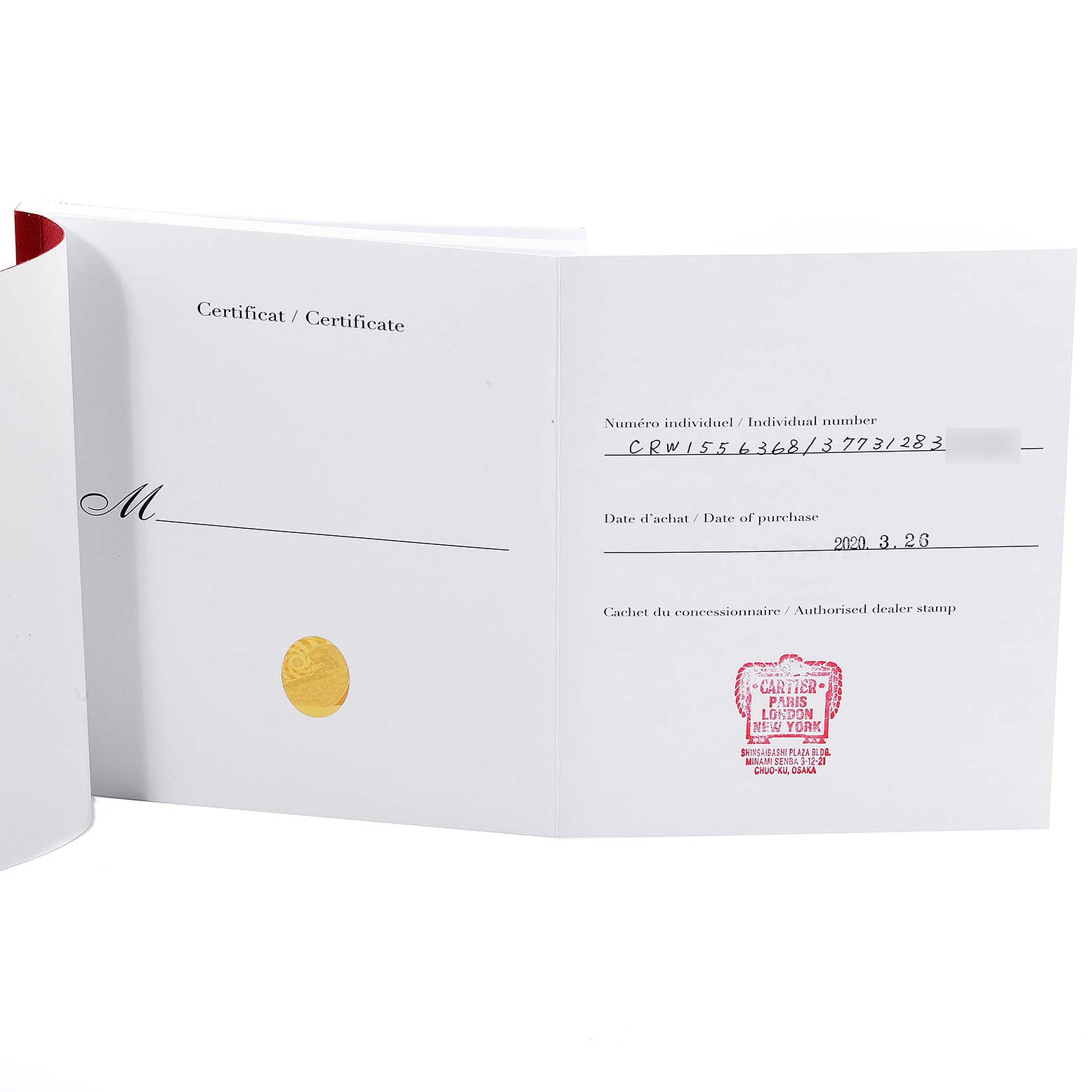 This image shows an open certificate for a Rotonde model watch by Cartier, including an individual number and dealer stamp.