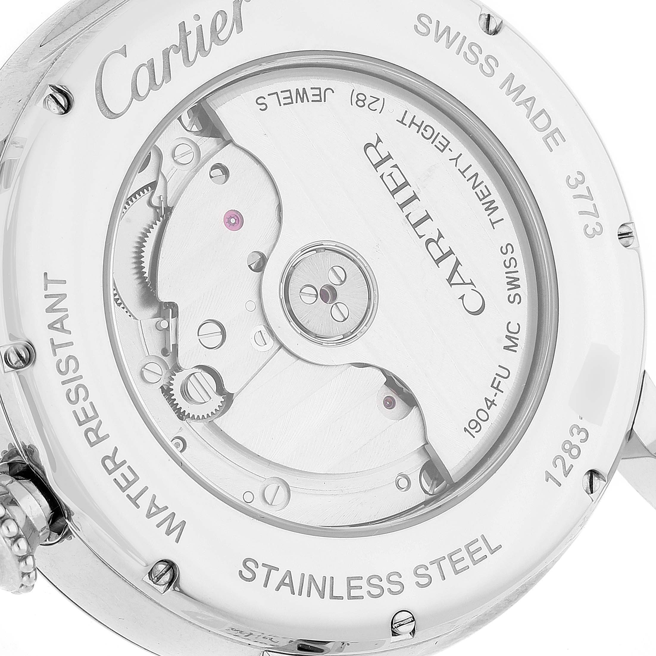 The image shows the back case and inner mechanism of a Rotonde model by Cartier, emphasizing its stainless steel build and movement.