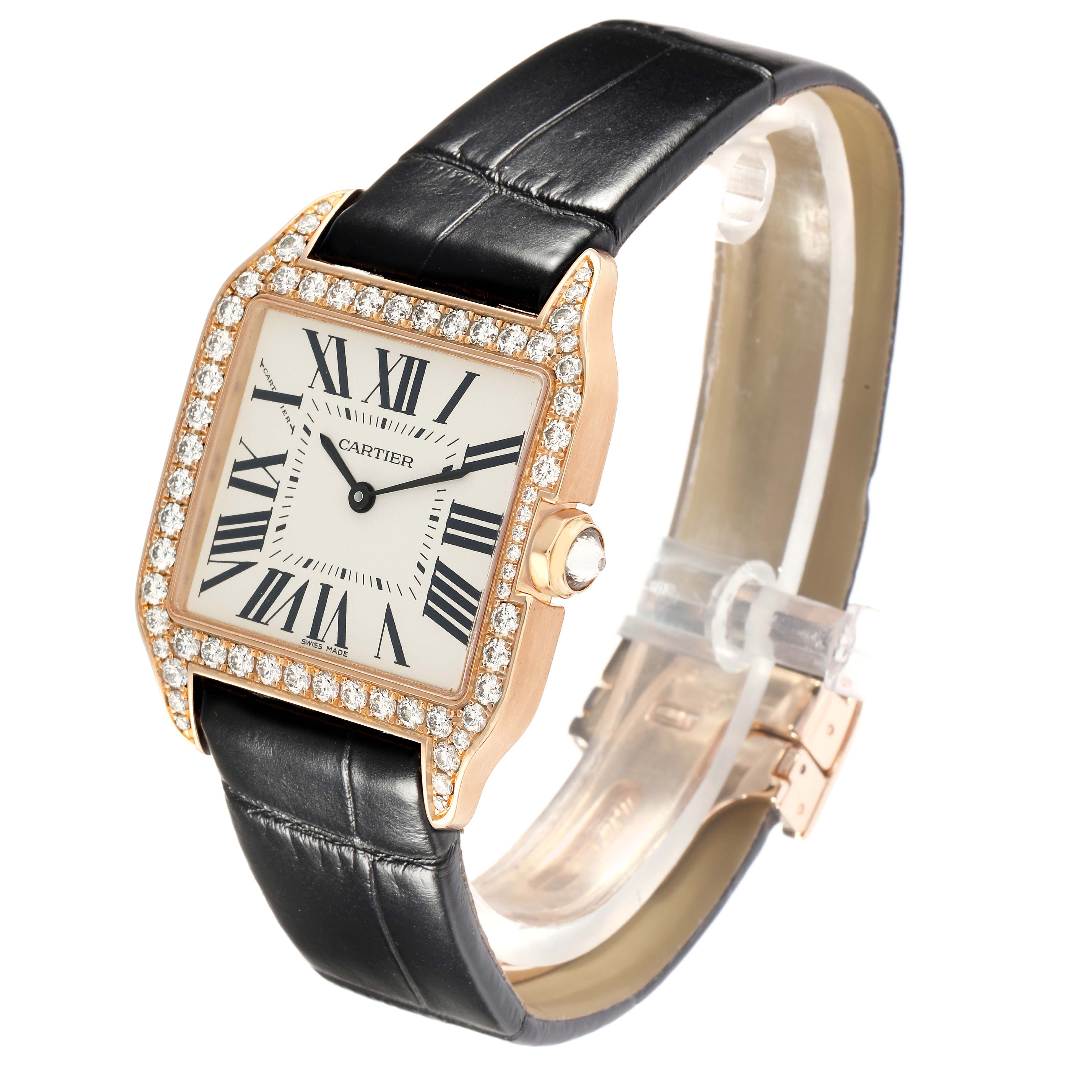 The Cartier Santos Dumont WH100351 Men
s Rose Gold Silver Dial watch is angled to show the face, bezel, crown, and partially open leather strap.