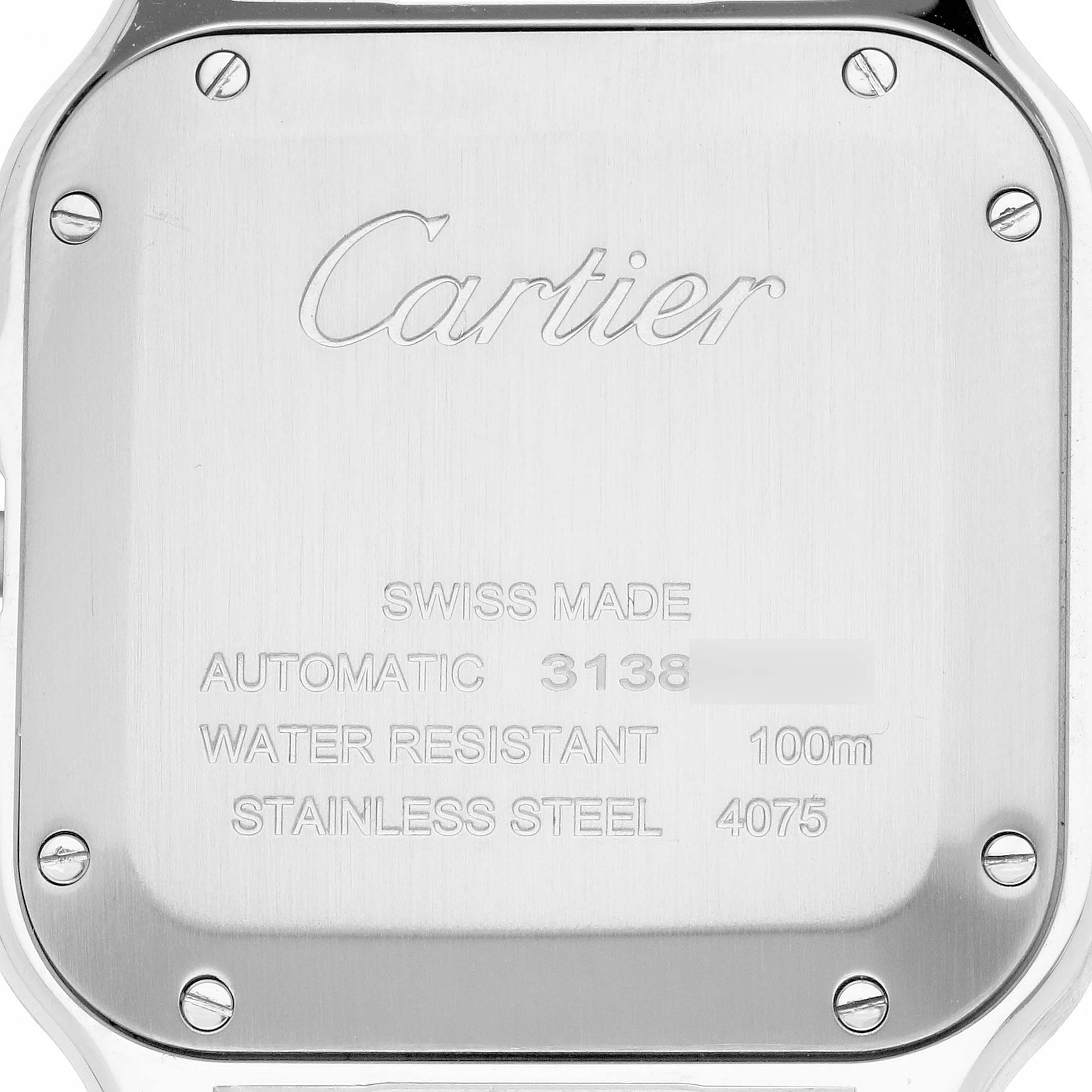 The image shows the back of a Cartier Santos WSSA0029 Men
s Stainless Steel Silver Dial watch, highlighting the brand, model details, and screws.