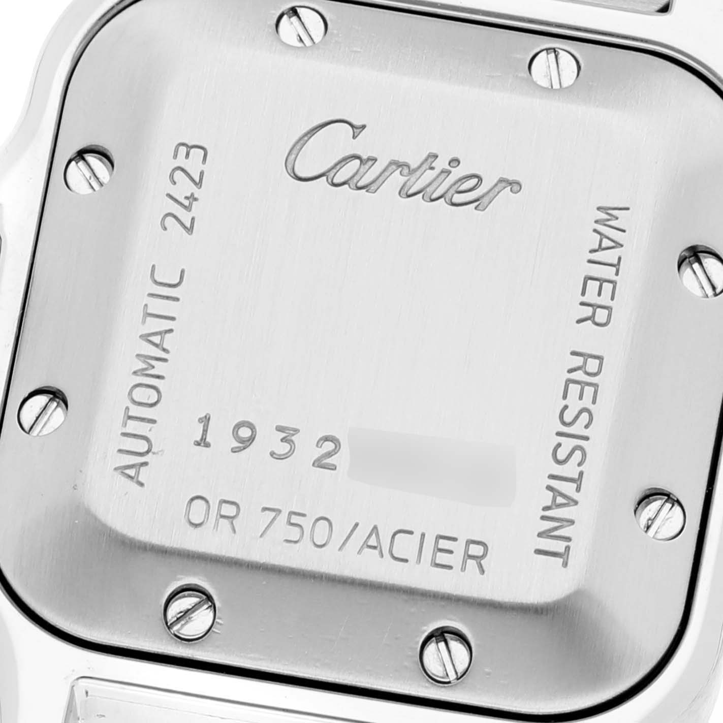 This image shows the backside of a Cartier Santos W20057C4 Women's Stainless Steel Silver Dial W20057C4 Women's Stainless Steel Silver Dial watch, showcasing its engravings and screws.