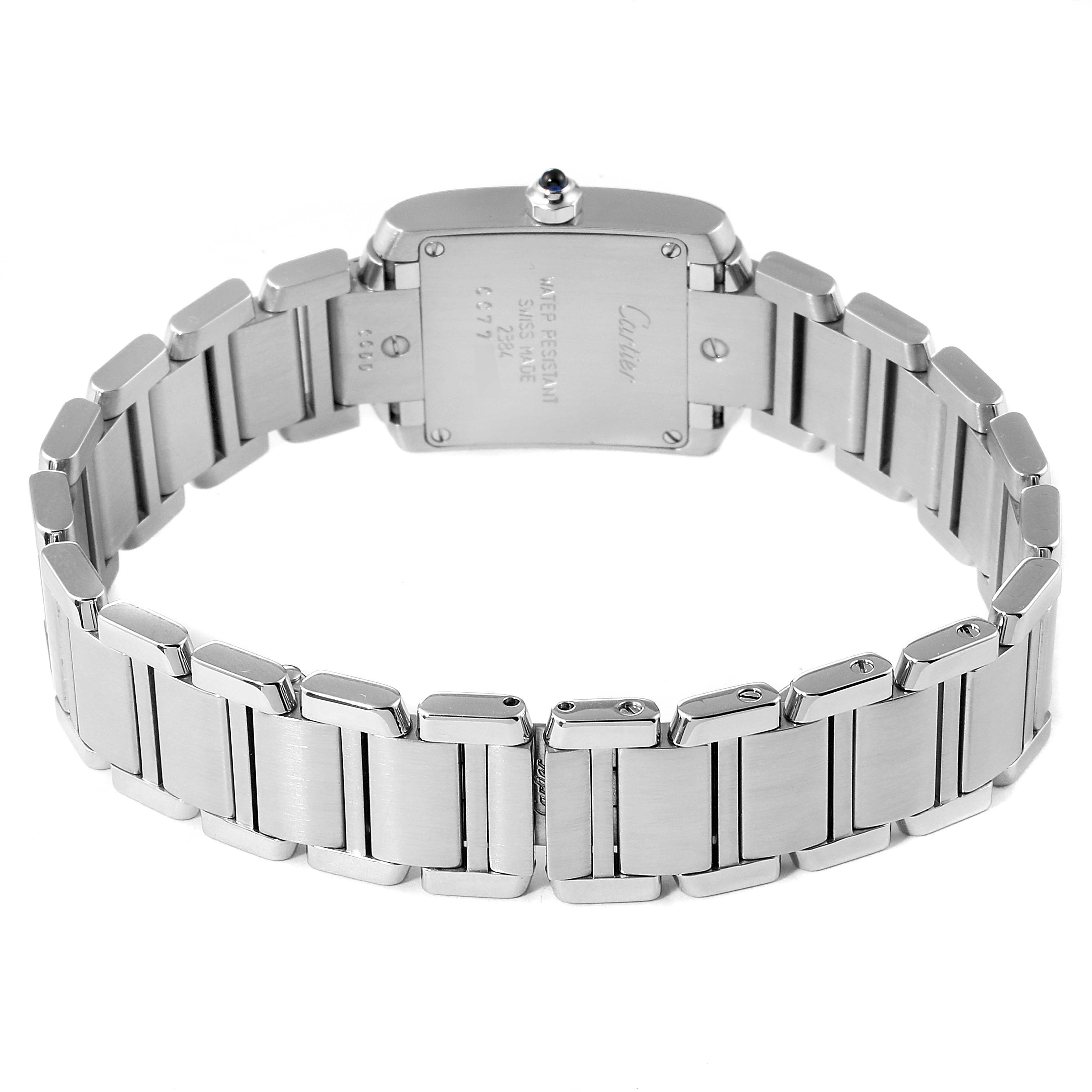 The image shows the back of a Cartier Tank Française watch, highlighting its bracelet links and case back.