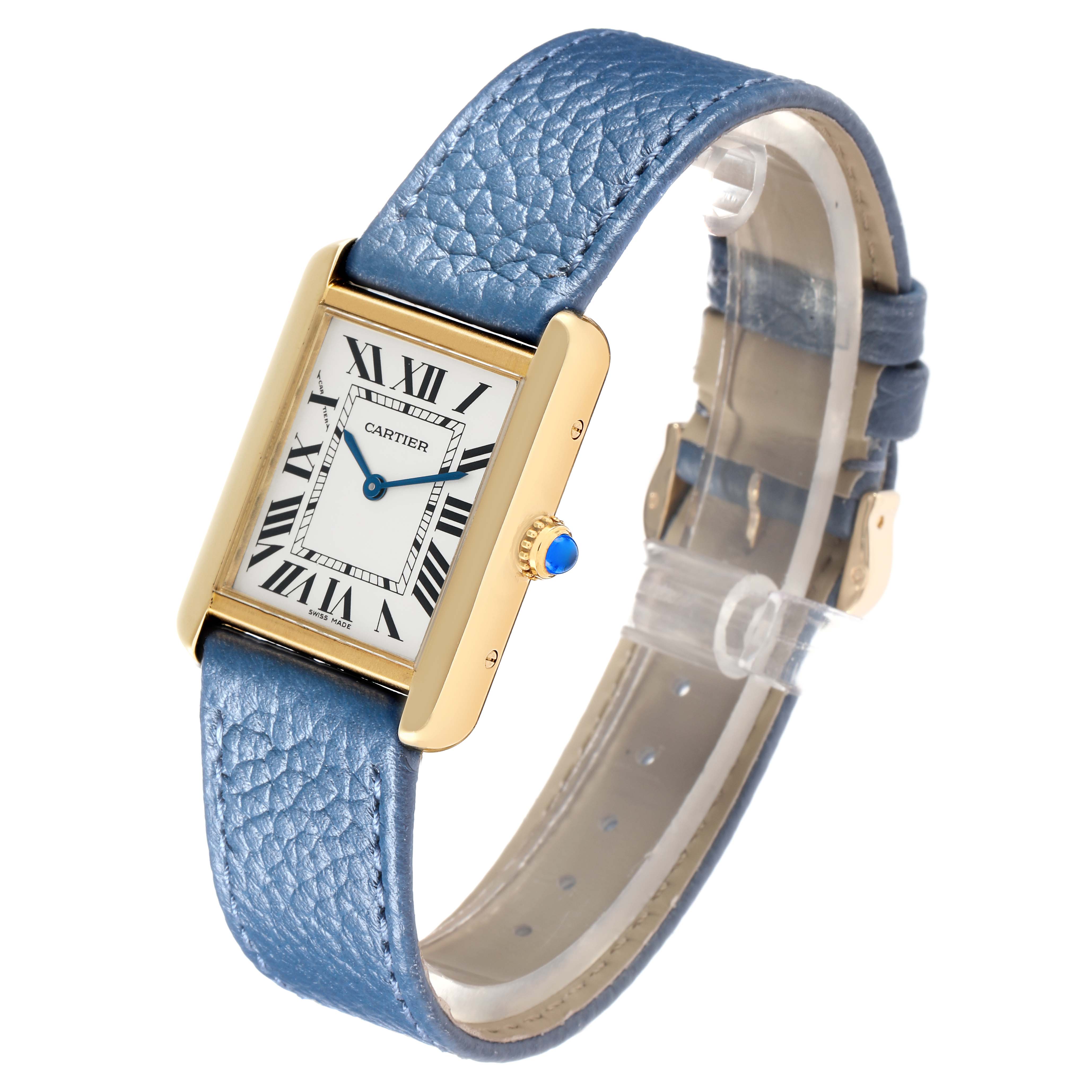 The Cartier Tank Solo W1018755 Women
s Yellow Gold Silver Dial watch is shown at an angle displaying the face, case, crown, and blue leather strap.