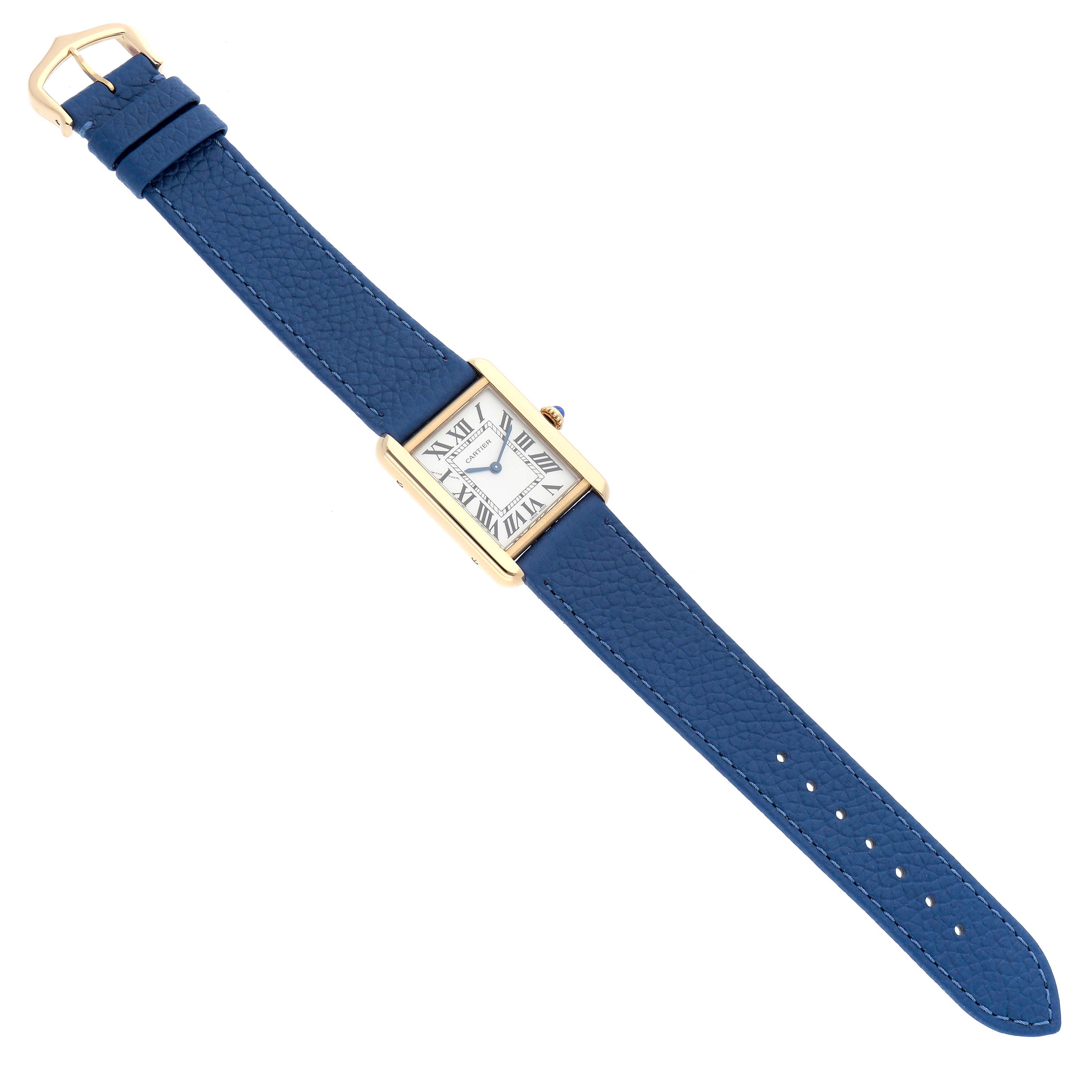 The Cartier Tank Solo W1018755 Women
s Yellow Gold Silver Dial watch is shown from a top-down angle, featuring the blue leather strap and rectangular gold case.