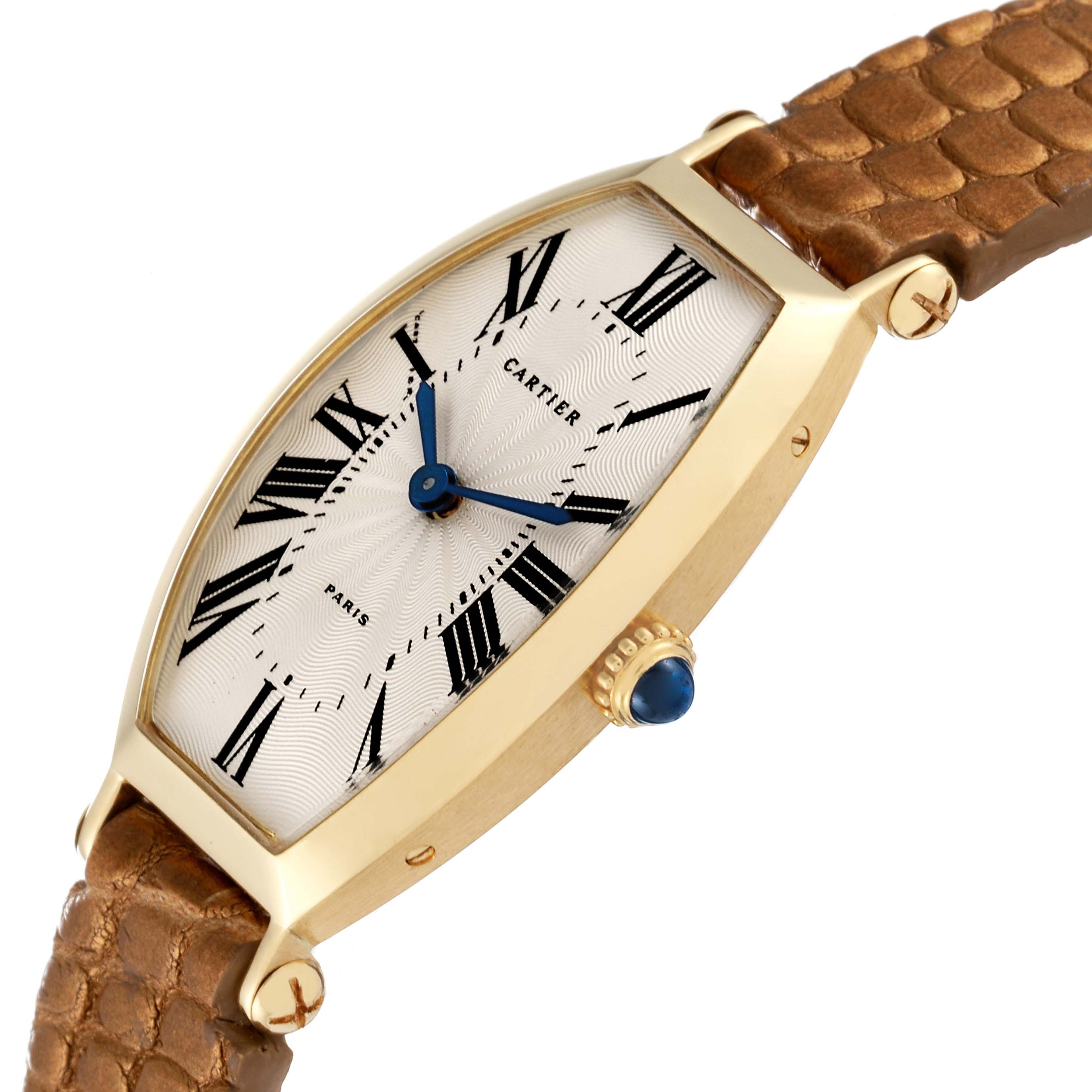 The image shows a side angle of the Cartier Tonneau Women
s Yellow Gold Silver Dial Women
s Yellow Gold Silver Dial model, displaying its gold casing, leather strap, and blue crown.