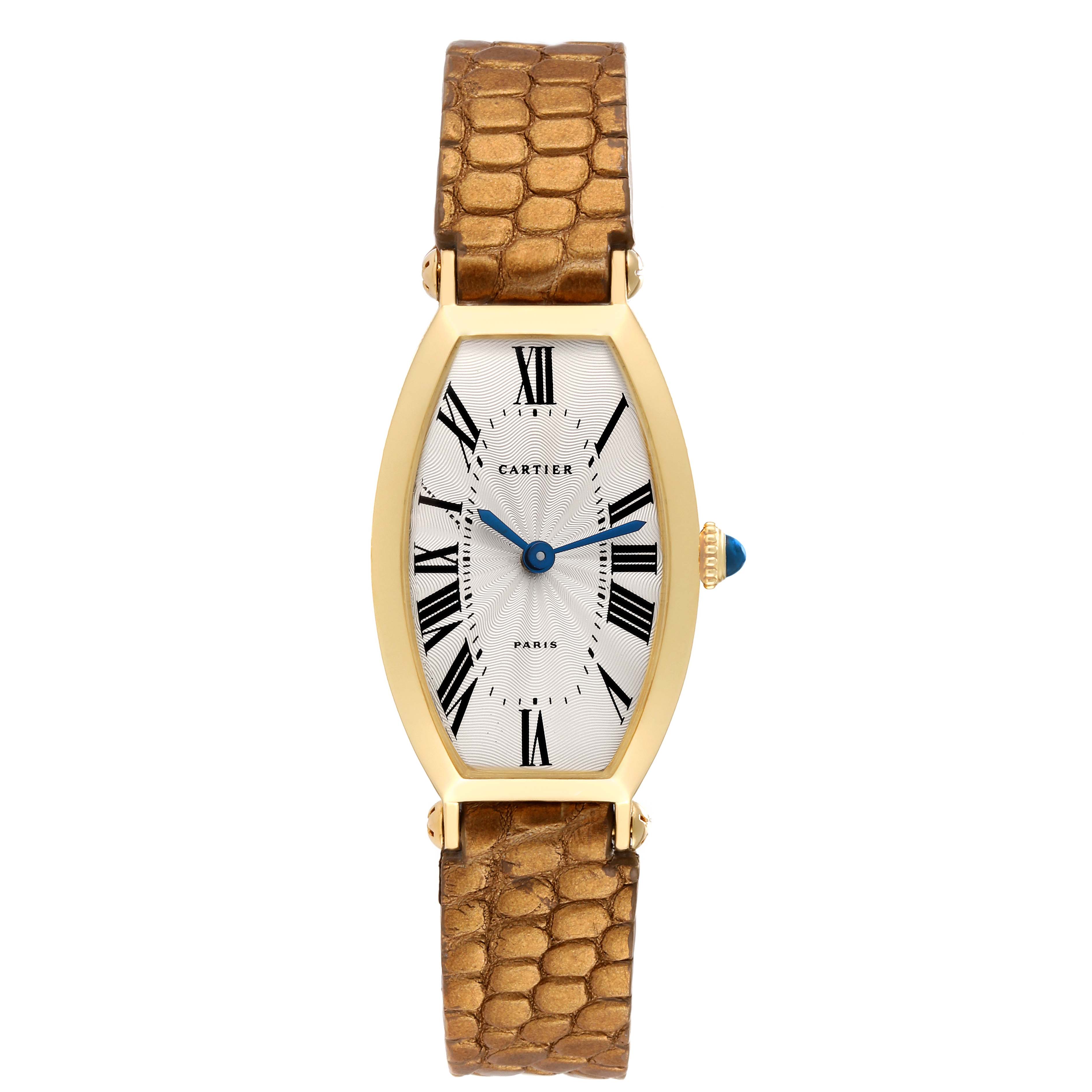 The Cartier Tonneau Women
s Yellow Gold Silver Dial Women
s Yellow Gold Silver Dial watch is shown from a front-angle view, displaying the face, case, crown, and leather strap.