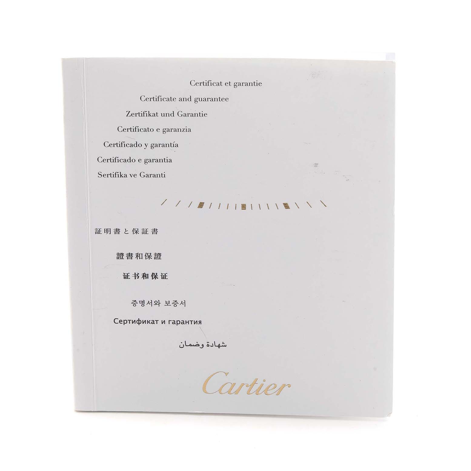 The image shows a Cartier Tonneau WE400131 Women
s White Gold Silver Dial watch certificate and guarantee booklet from a front angle.