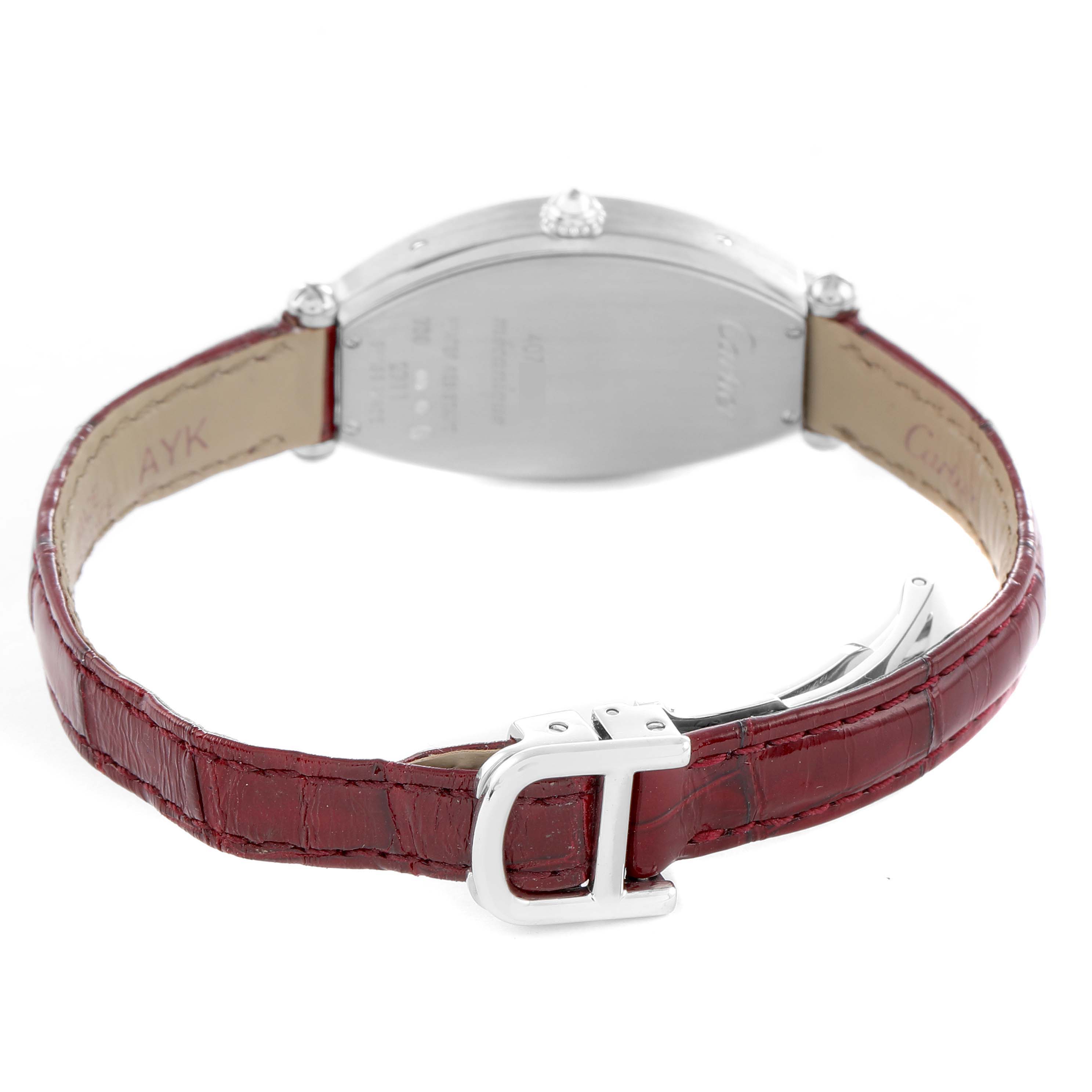 The Cartier Tonneau WE400131 Women
s White Gold Silver Dial watch is shown from the back, highlighting the red leather strap and buckle.